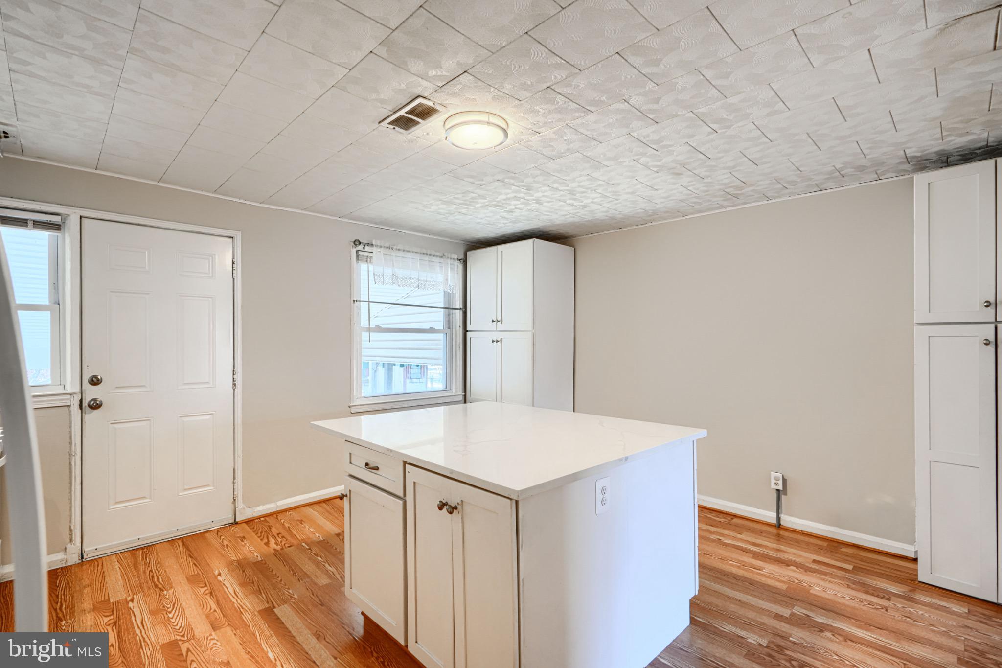 602 Aldworth Road Dundalk, MD 21222 - Photo 11 of 27 Bright and airy kitchen with modern charm.