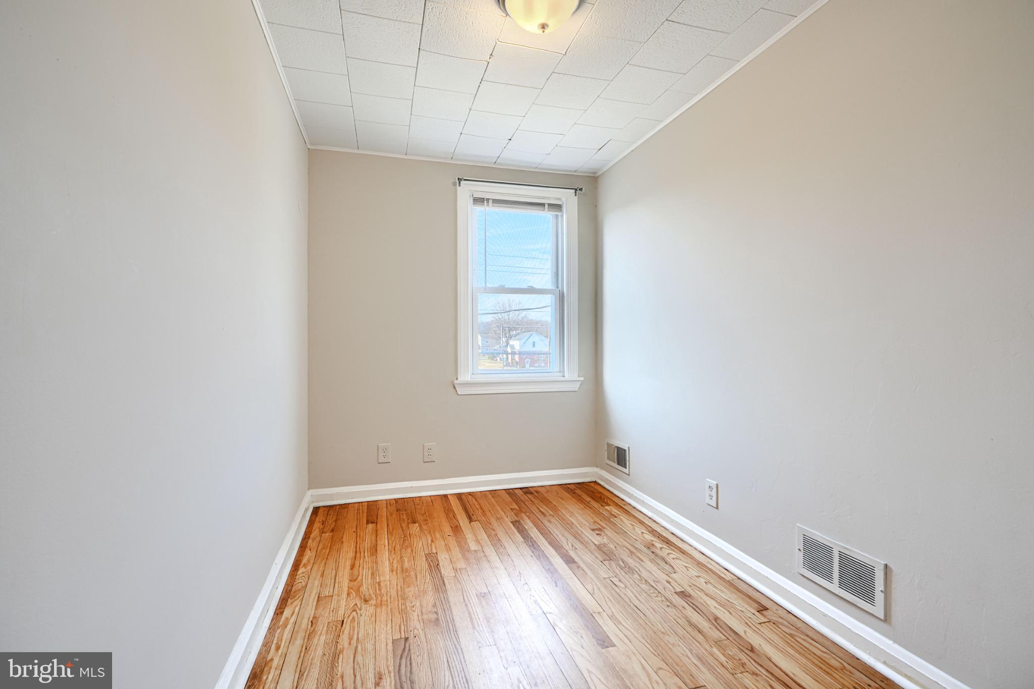 602 Aldworth Road Dundalk, MD 21222 - Photo 12 of 27 Bright and airy space with hardwood floors.