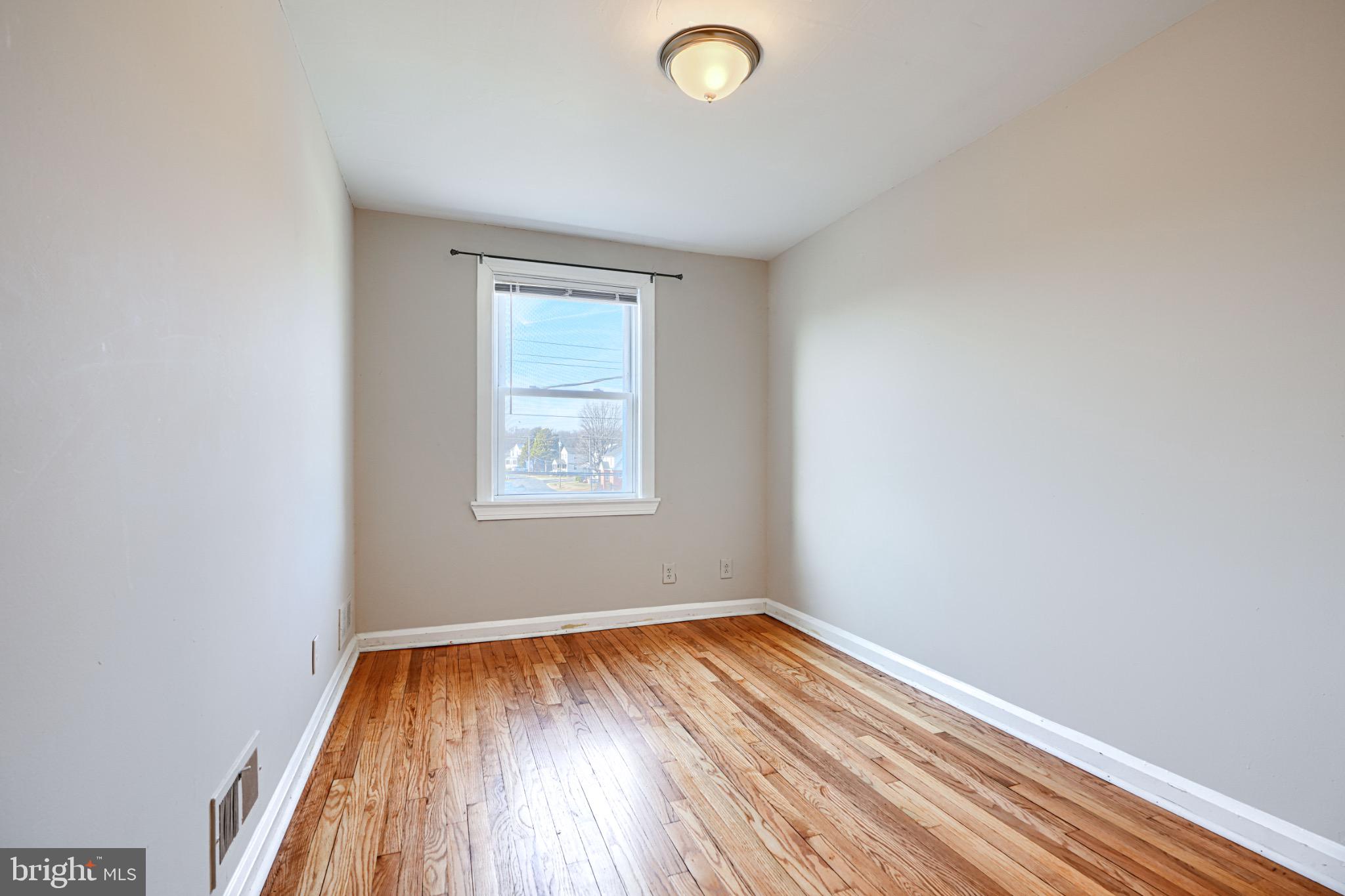 602 Aldworth Road Dundalk, MD 21222 - Photo 14 of 27 Bright and airy space with hardwood floors.