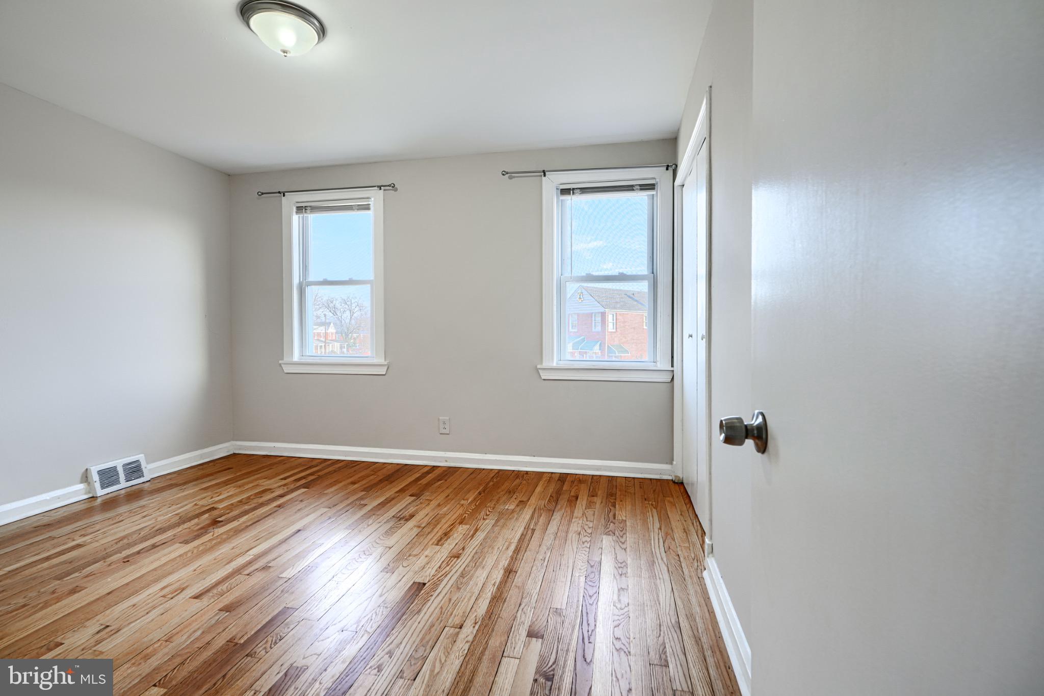 602 Aldworth Road Dundalk, MD 21222 - Photo 17 of 27 Bright and airy room with hardwood floors.