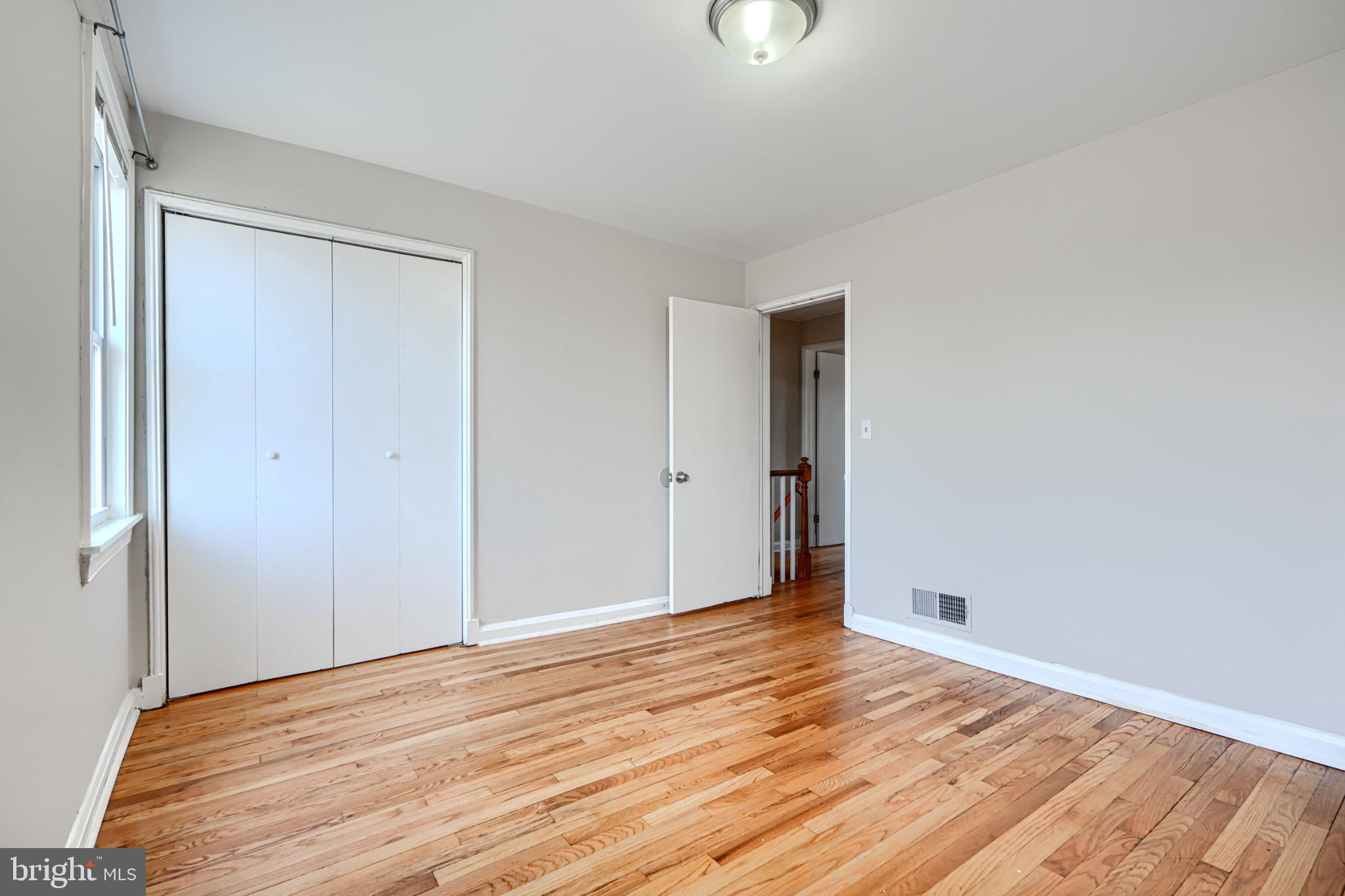 602 Aldworth Road Dundalk, MD 21222 - Photo 18 of 27 Bright and airy space with hardwood floors.