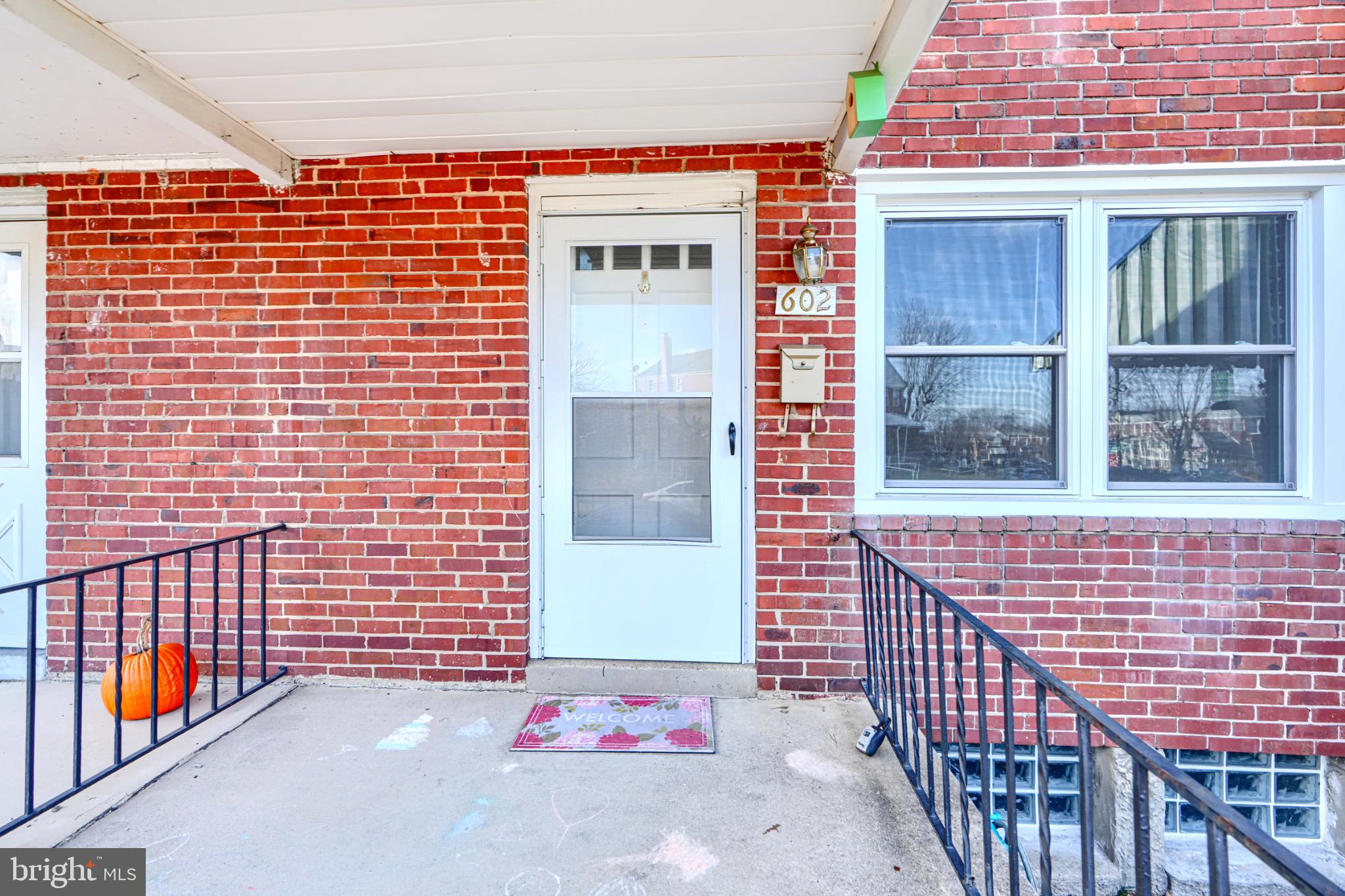 602 Aldworth Road Dundalk, MD 21222 - Photo 3 of 27 Charming brick entryway with welcoming porch.
