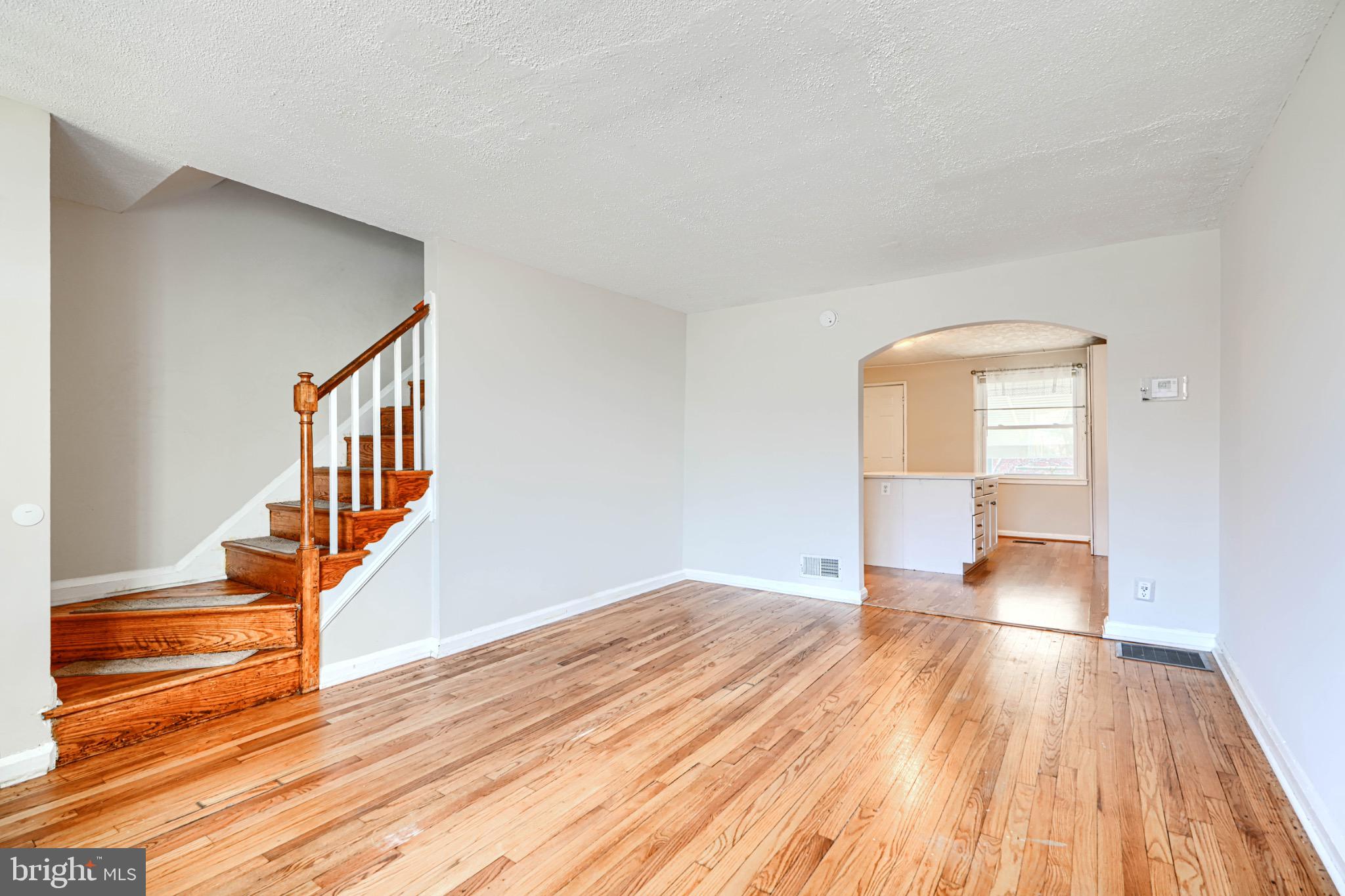 602 Aldworth Road Dundalk, MD 21222 - Photo 4 of 27 Spacious entryway with elegant staircase.