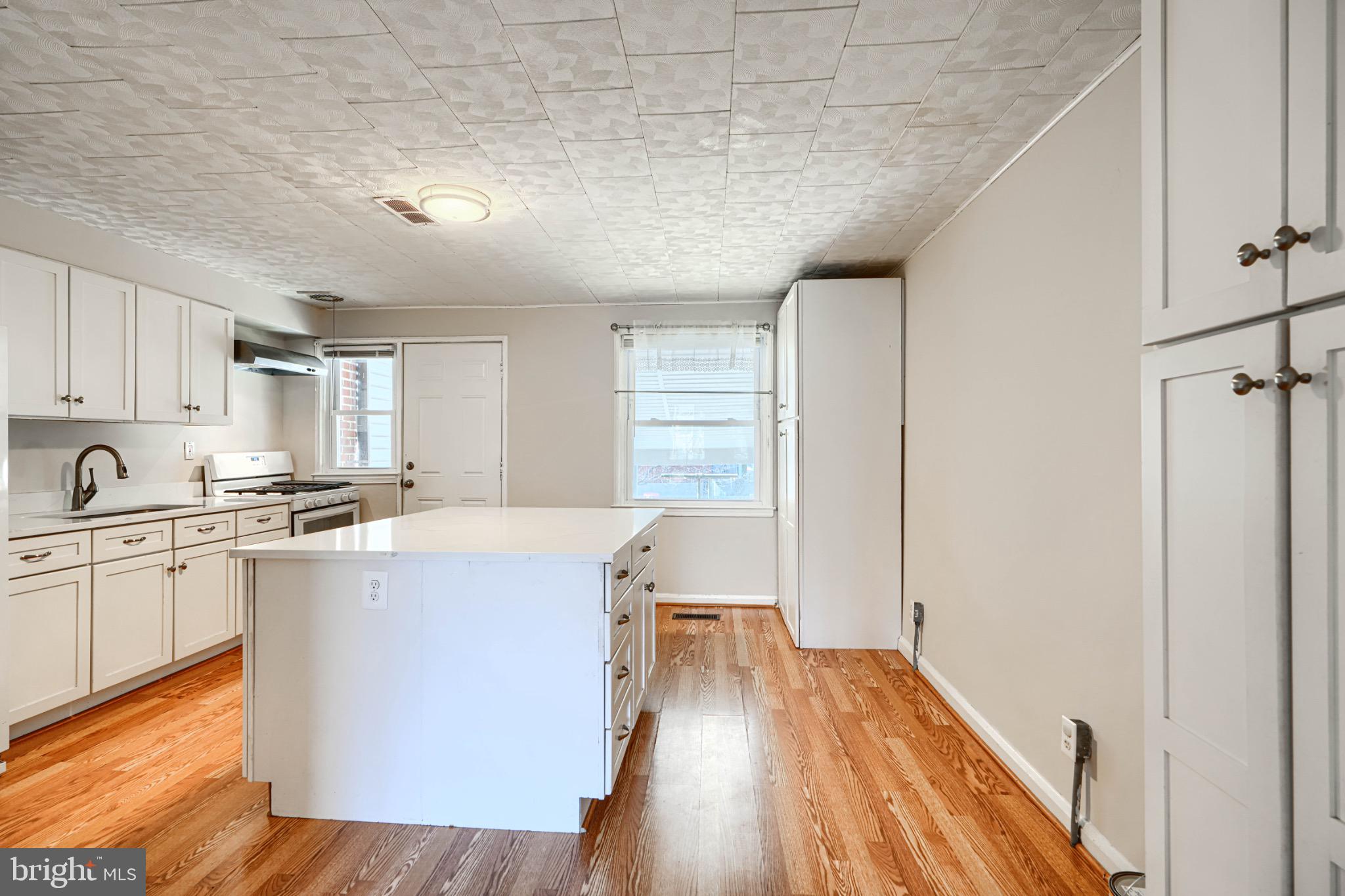 602 Aldworth Road Dundalk, MD 21222 - Photo 6 of 27 Bright and airy kitchen with modern finishes.