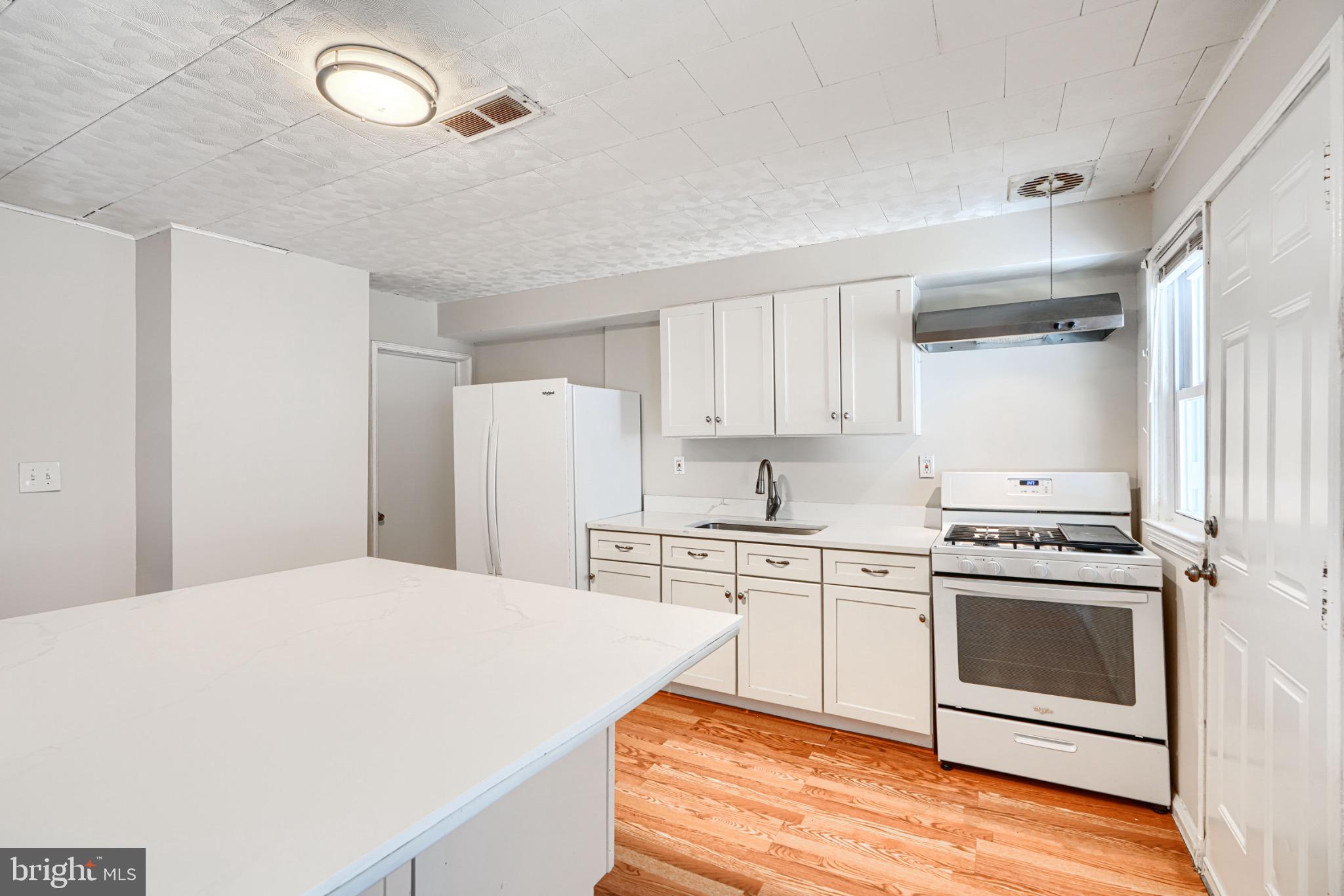 602 Aldworth Road Dundalk, MD 21222 - Photo 8 of 27 Bright and airy kitchen with modern finishes.