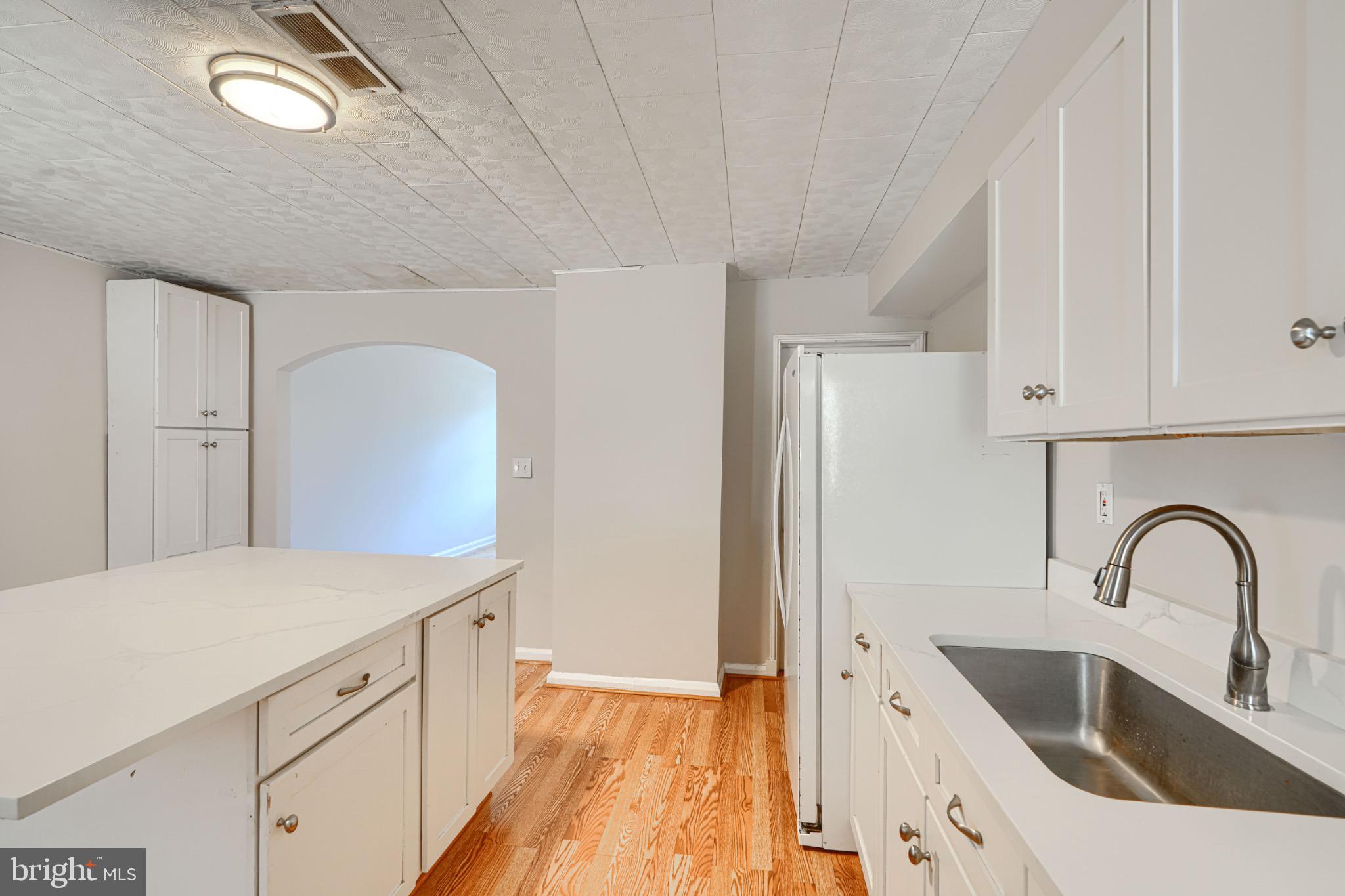 602 Aldworth Road Dundalk, MD 21222 - Photo 10 of 27 Bright and airy kitchen with modern finishes.