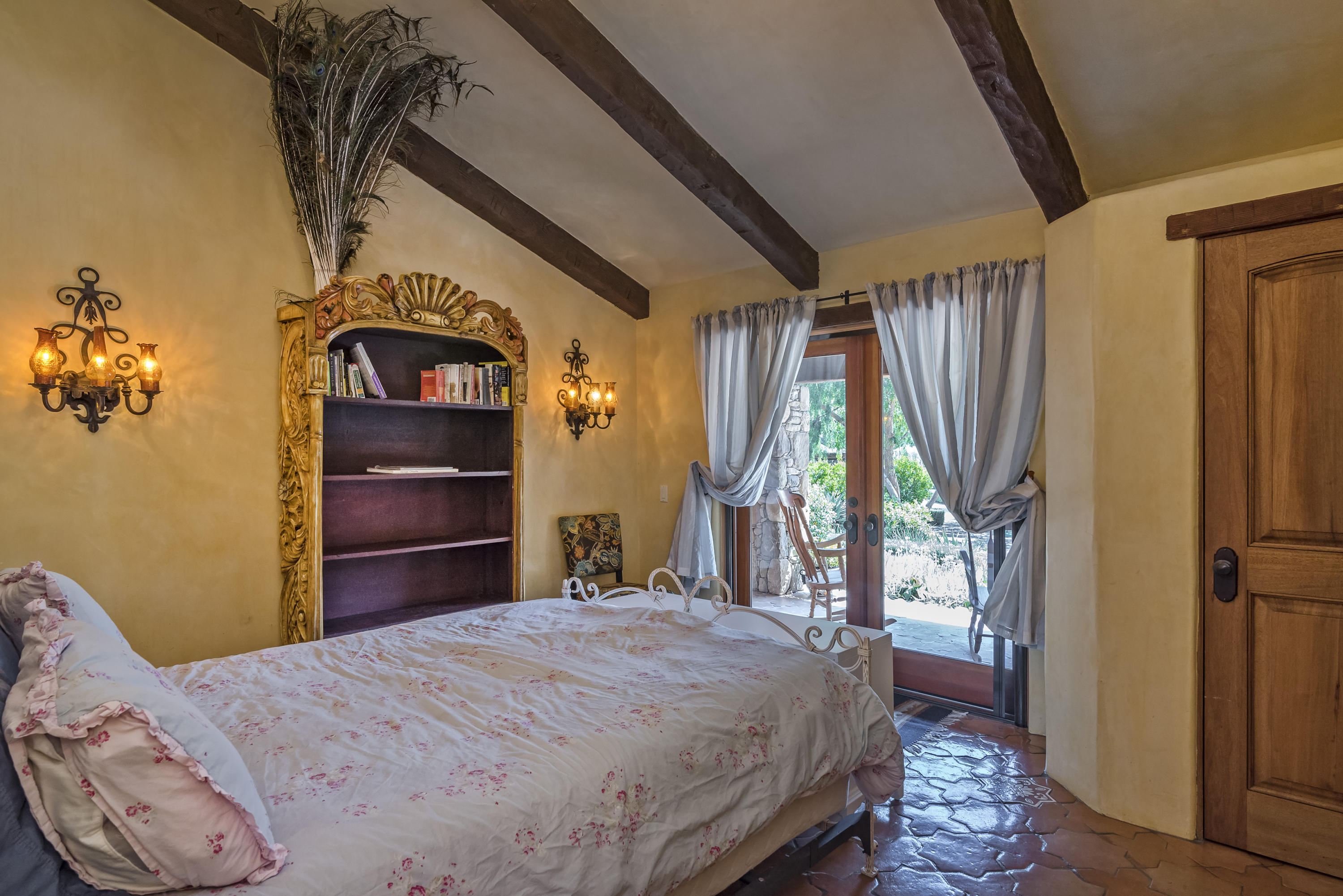 129 Grapevine Road Oak View, CA 93022 - Photo 16 of 24 a bedroom with a bed and a large mirror