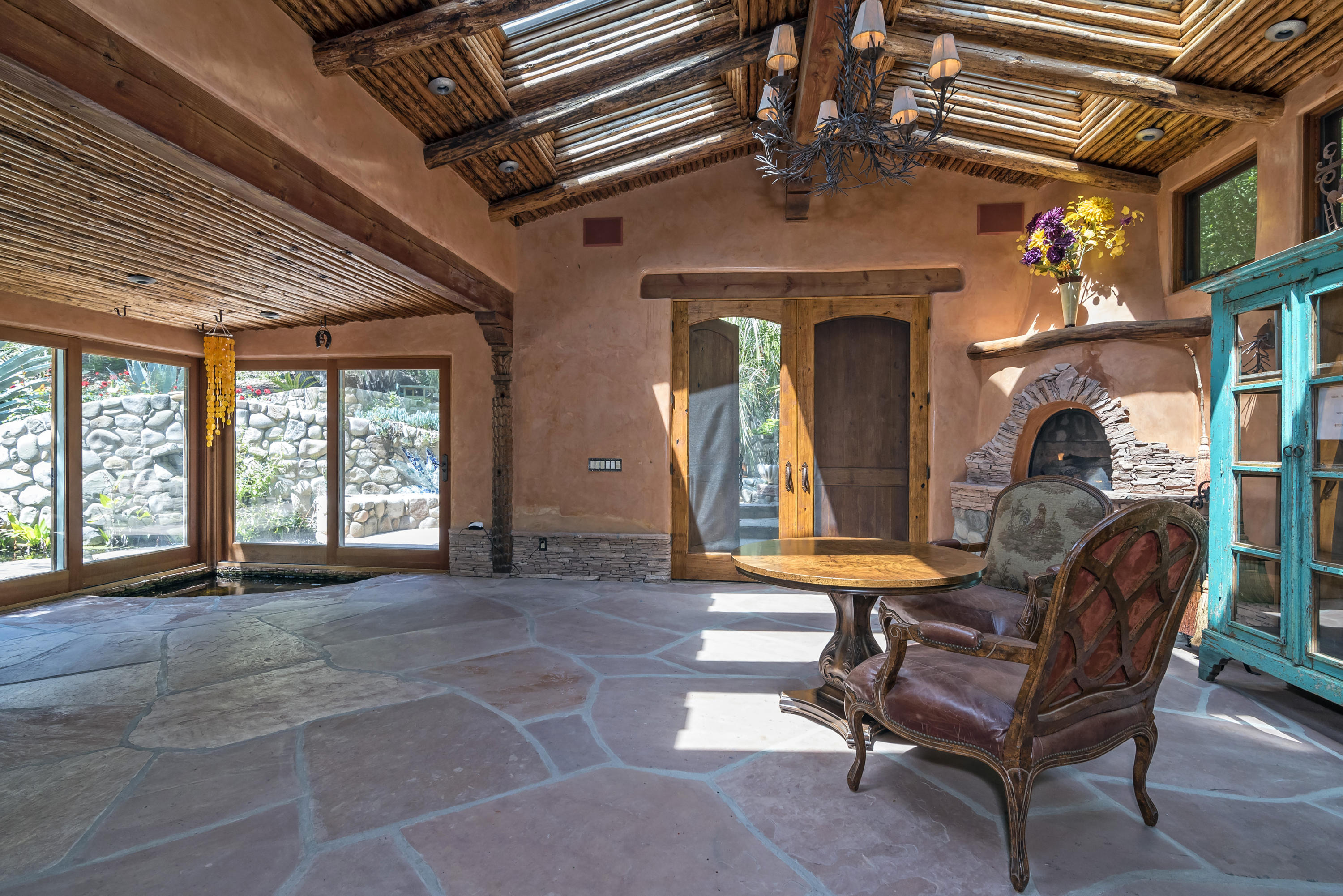 129 Grapevine Road Oak View, CA 93022 - Photo 19 of 24 a living room with furniture and a large window