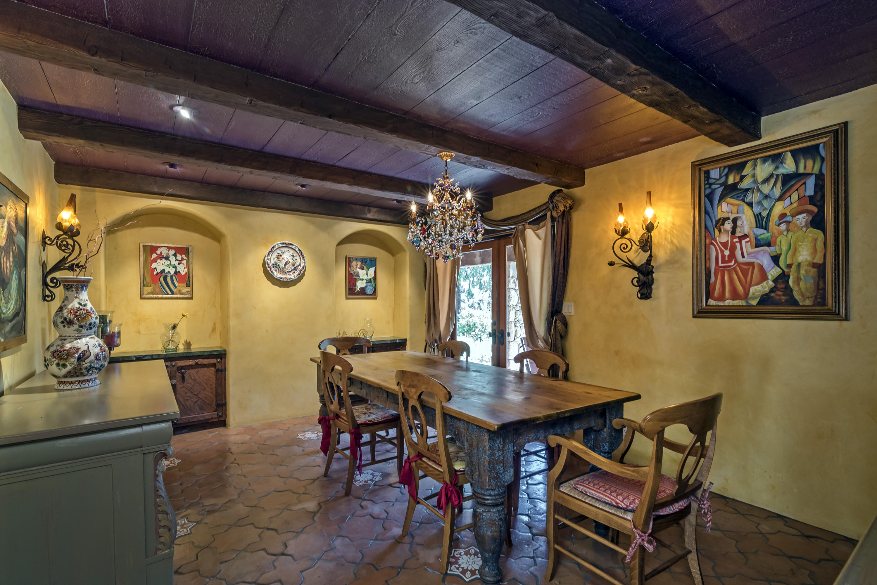 129 Grapevine Road Oak View, CA 93022 - Photo 10 of 24 a view of a dining room with furniture and chandelier
