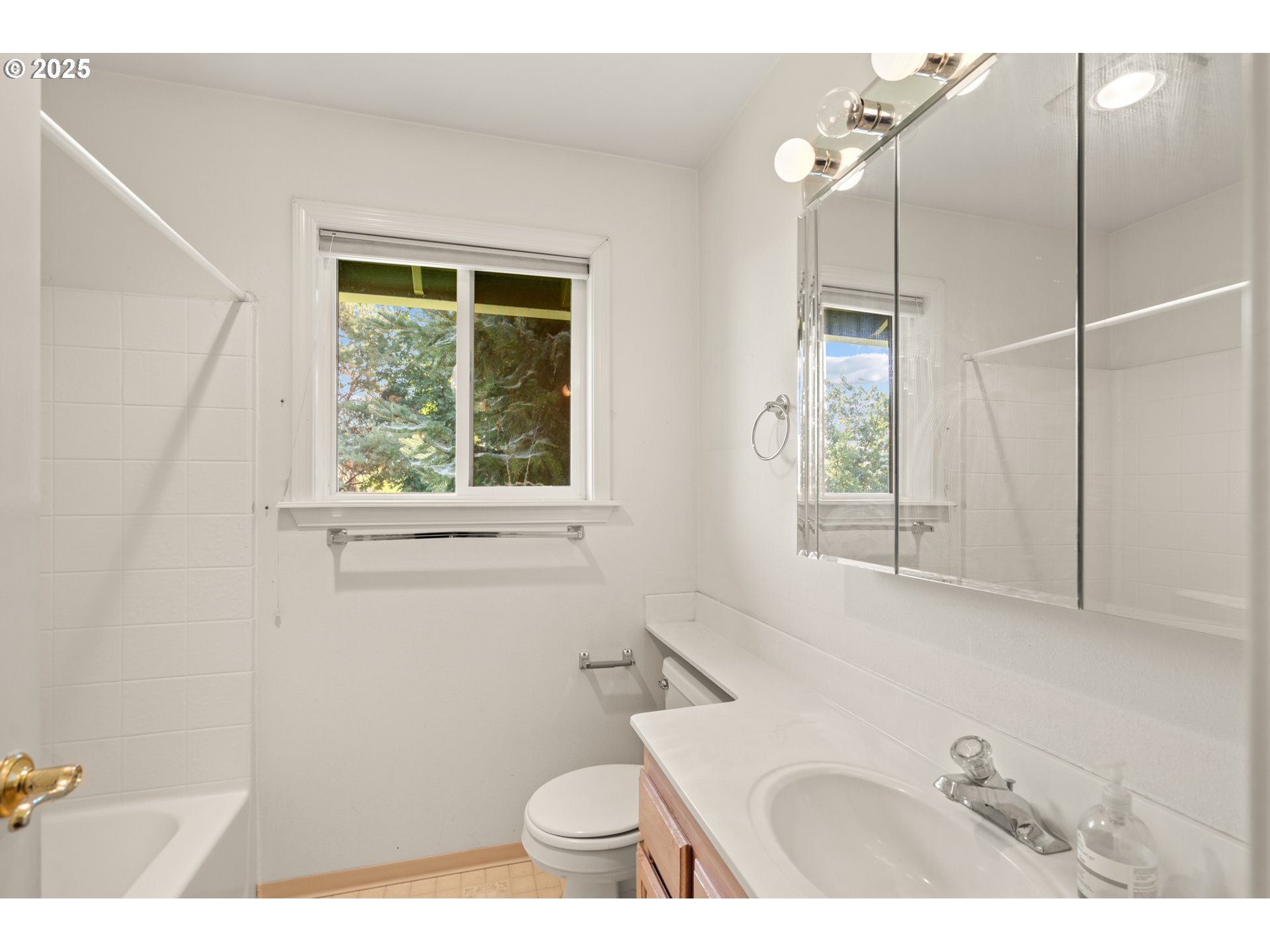 1837 Southwest Athens Avenue Pendleton, OR 97801 - Photo 23 of 42 a bathroom with a sink a toilet a window and shower