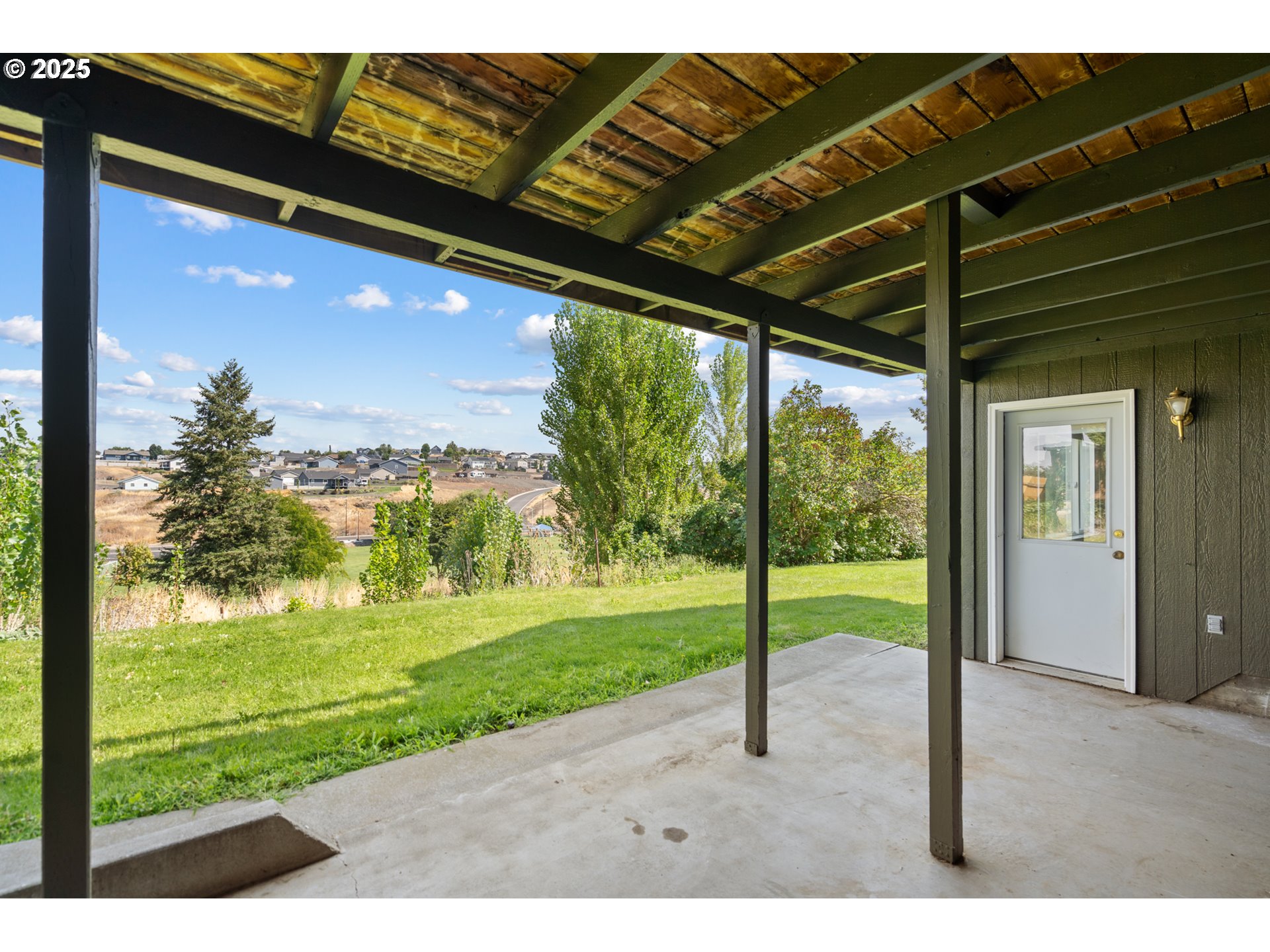 1837 Southwest Athens Avenue Pendleton, OR 97801 - Photo 33 of 42 a view of a room with porch and a yard
