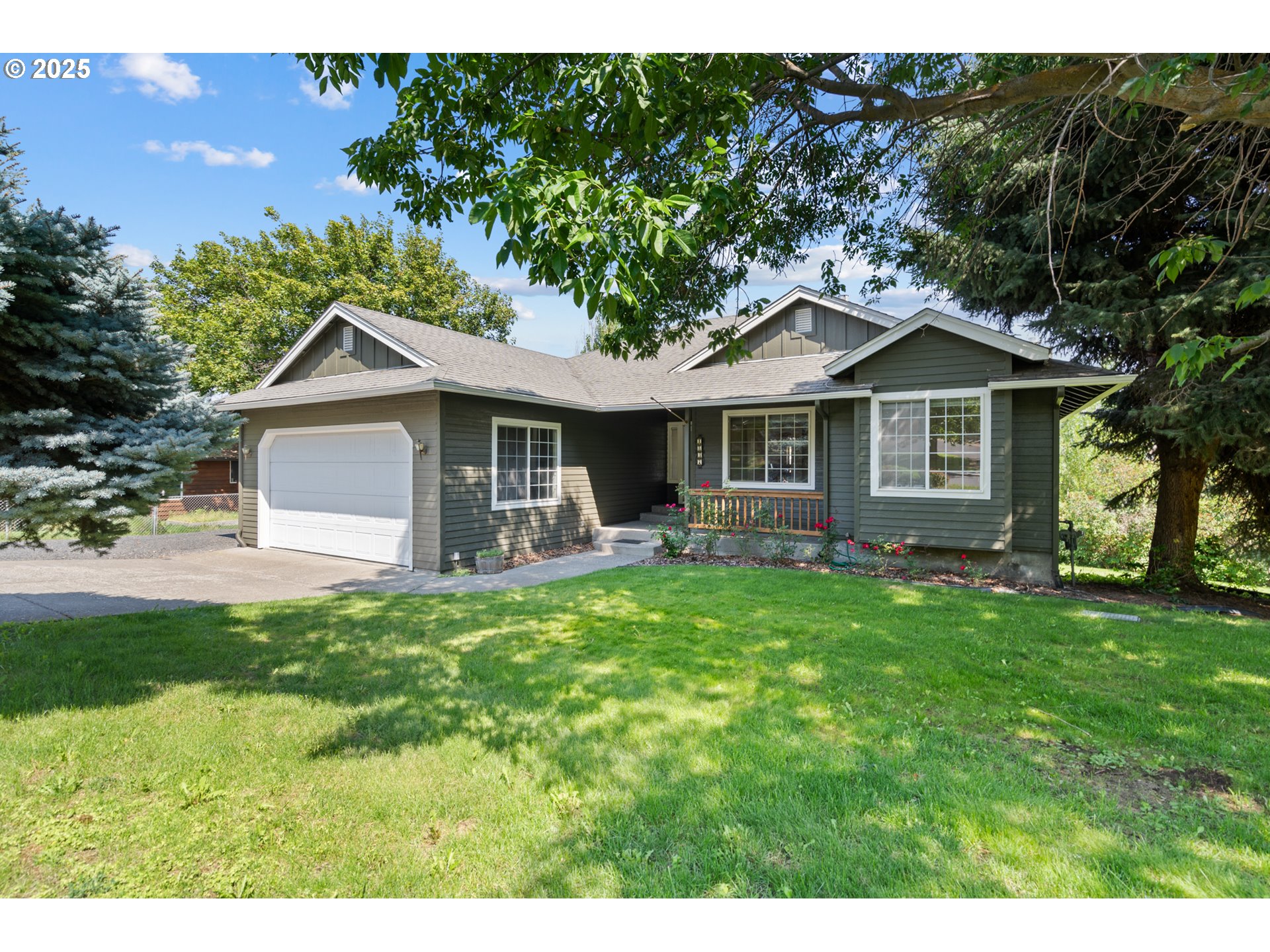1837 Southwest Athens Avenue Pendleton, OR 97801 - Photo 36 of 42 a front view of a house with a garden