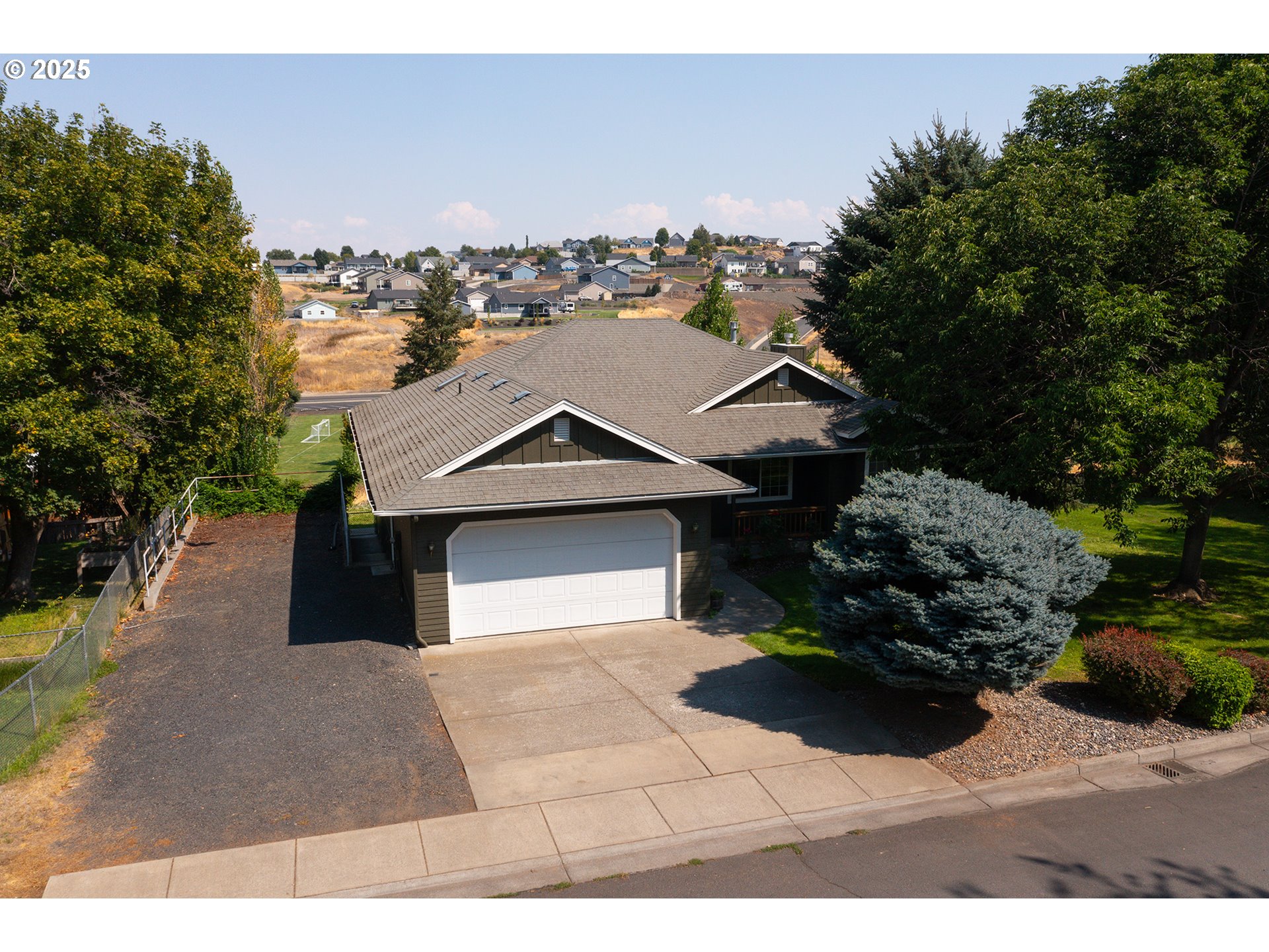 1837 Southwest Athens Avenue Pendleton, OR 97801 - Photo 37 of 42 a view of a house with a yard