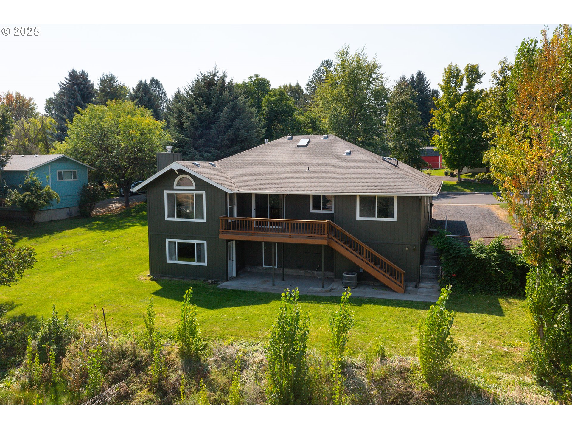 1837 Southwest Athens Avenue Pendleton, OR 97801 - Photo 4 of 42 a aerial view of a house with swimming pool next to a yard