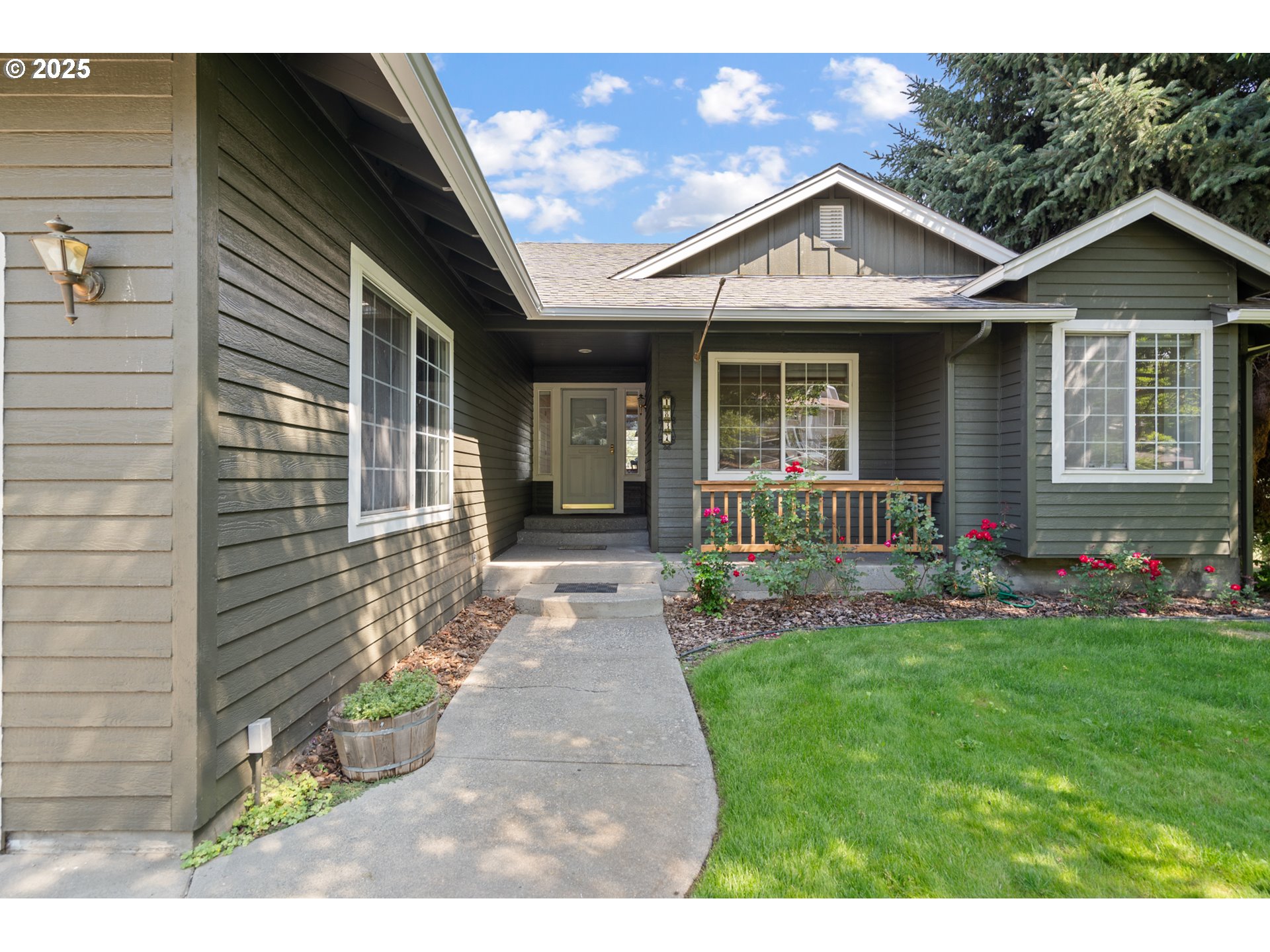 1837 Southwest Athens Avenue Pendleton, OR 97801 - Photo 7 of 42 a front view of a house with a yard and porch