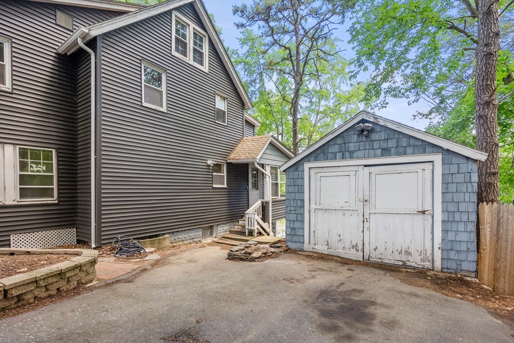 32 Undine Circle Springfield, MA 01109 - Photo 38 of 38 a view of a house with a yard and garage