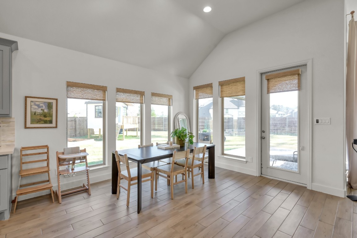 17801 Parnassum Path Conroe, TX 77302 - Photo 11 of 32 Dining with views of the backyard that make every meal feel a little more special.