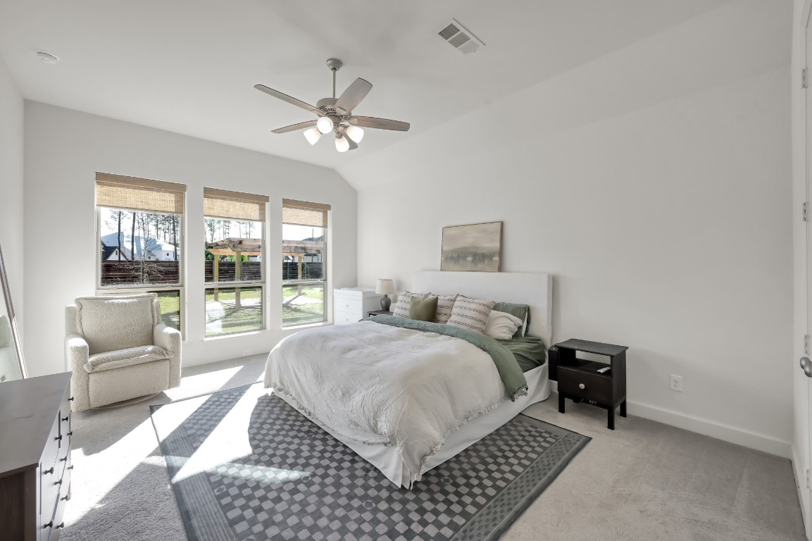 17801 Parnassum Path Conroe, TX 77302 - Photo 15 of 32 In this Primary Retreat, you will enjoy more natural light and backyard views!