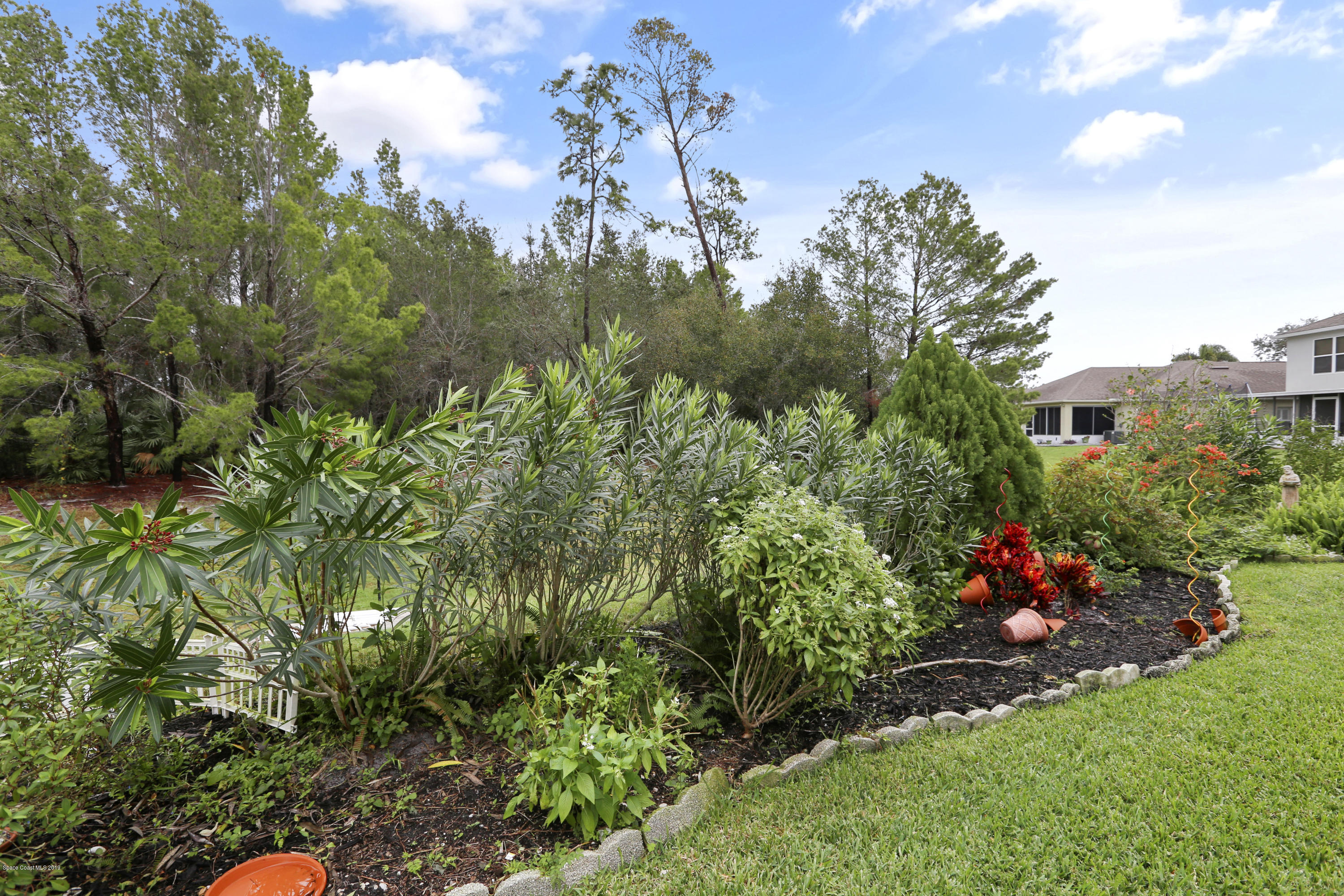 2149 Spring Creek Circle Palm Bay, FL 32905 - Photo 22 of 25 More Landscaping