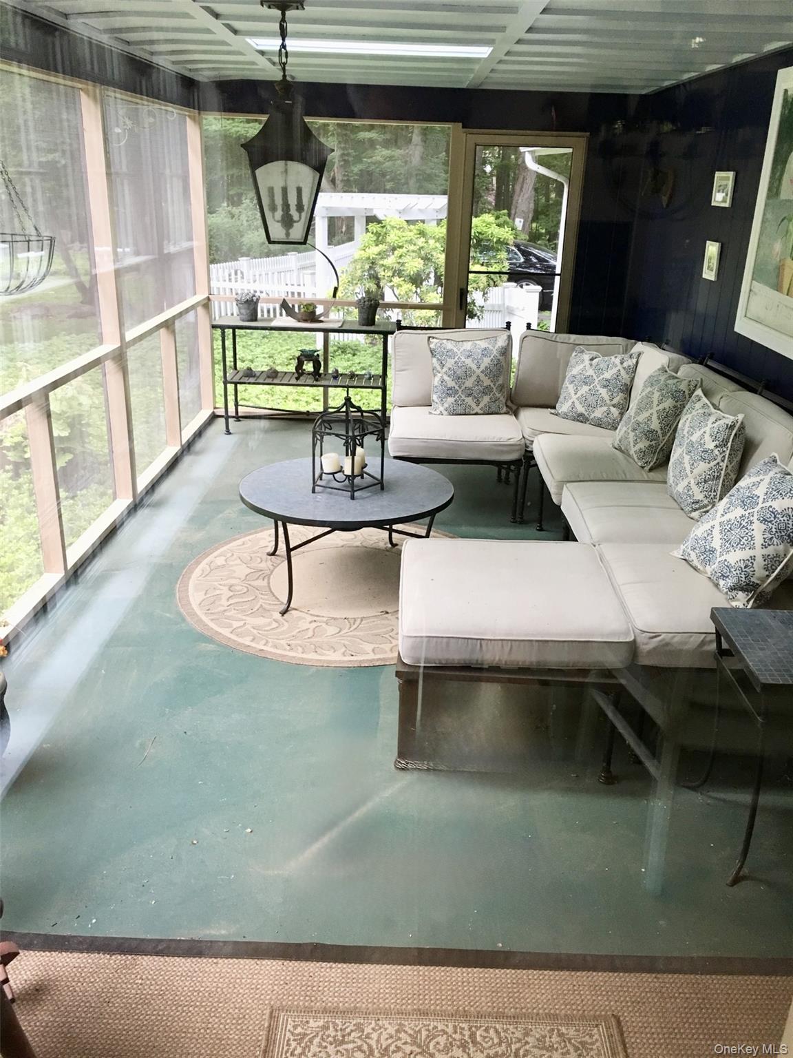 9 Cedar Hill Road Pound Ridge, NY 10576 - Photo 14 of 21 French doors lead to sun room and to mahogany deck.