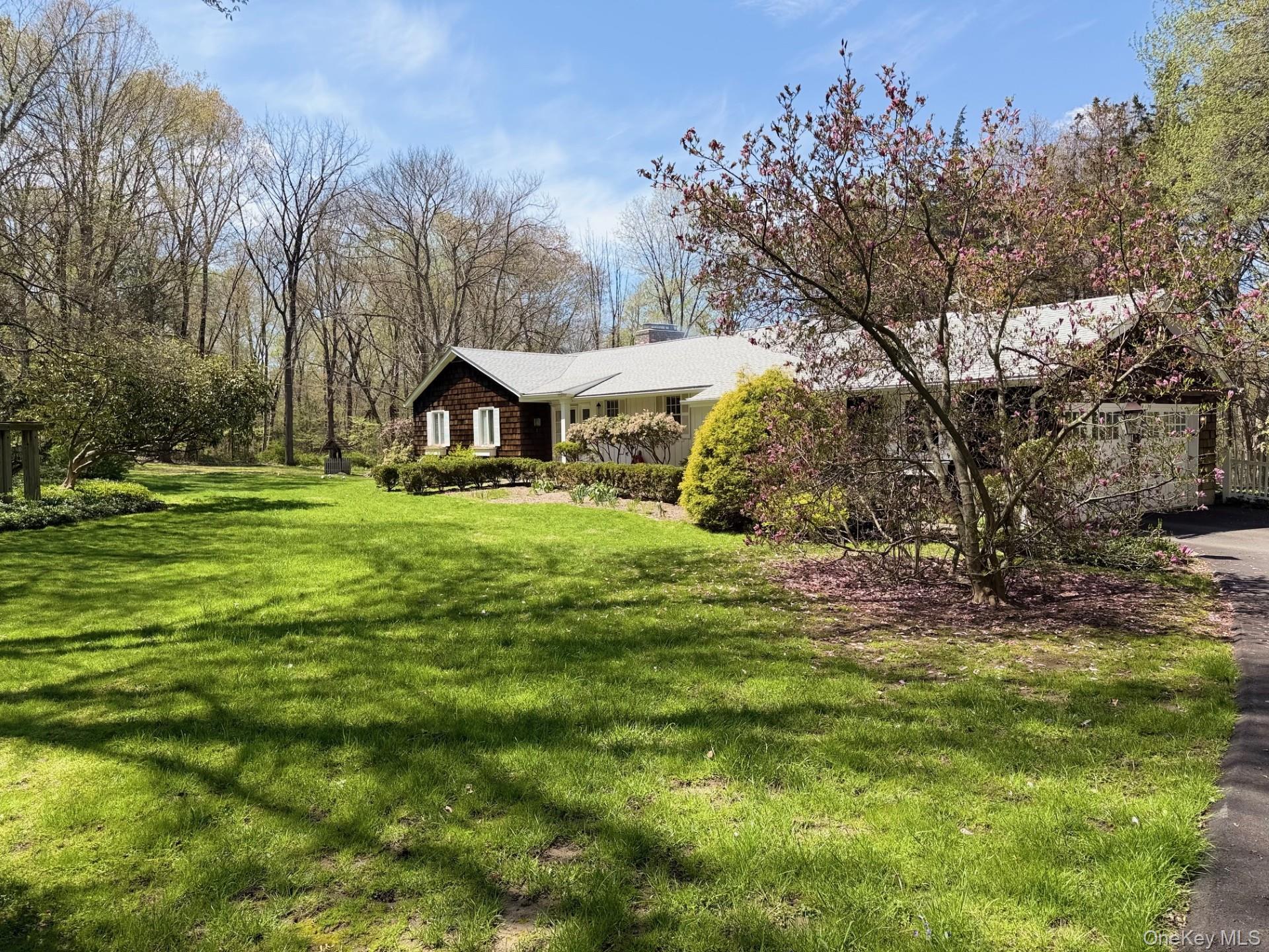 9 Cedar Hill Road Pound Ridge, NY 10576 - Photo 18 of 21 Serene bucolic setting with flowering trees and mature plantings