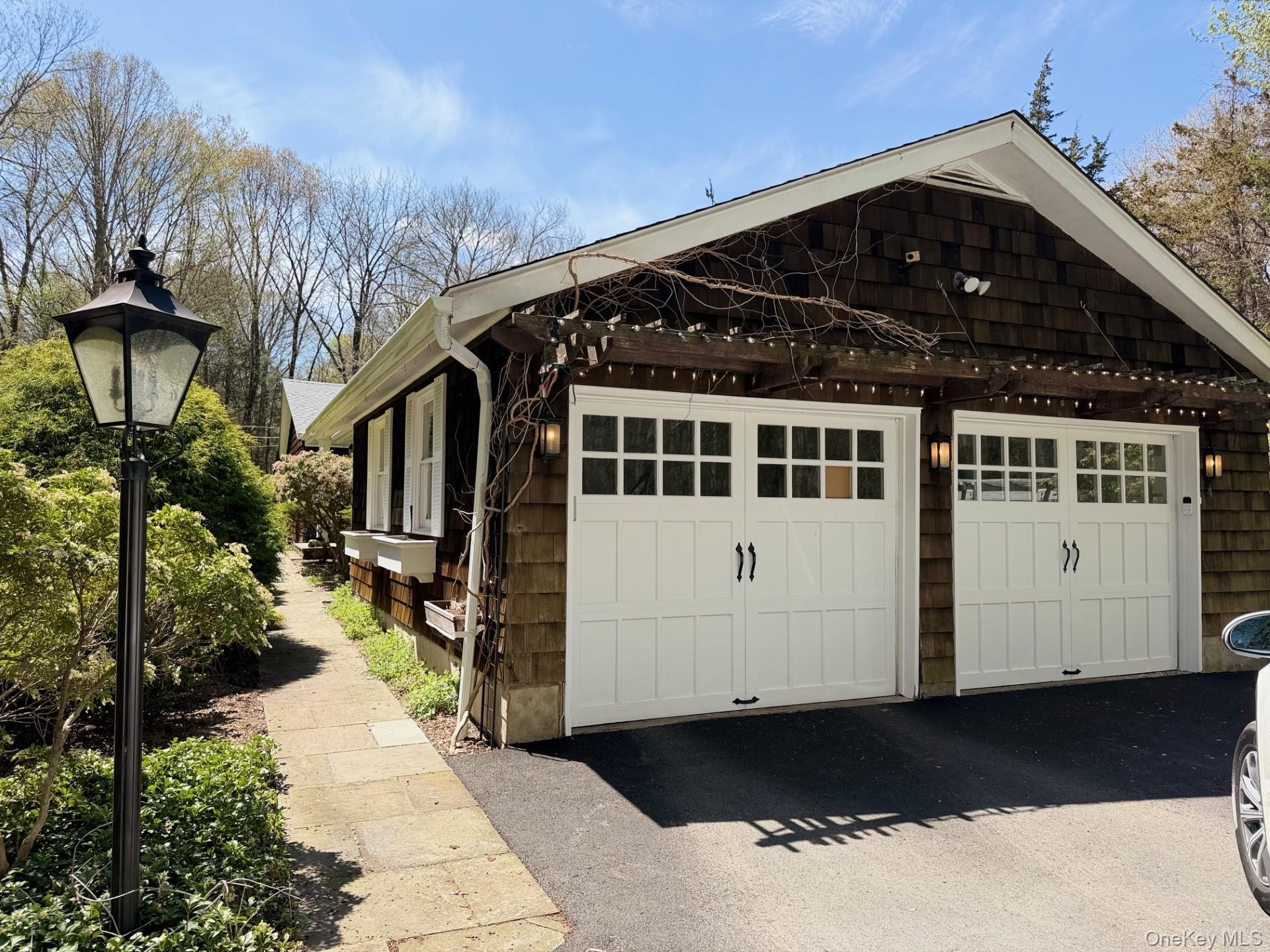 9 Cedar Hill Road Pound Ridge, NY 10576 - Photo 19 of 21 2 car garage with driveway with plenty of parking.