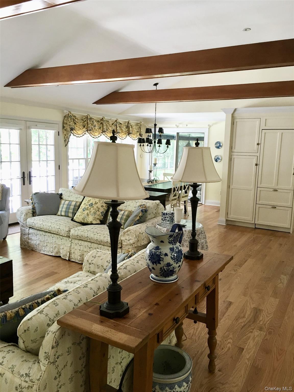 9 Cedar Hill Road Pound Ridge, NY 10576 - Photo 3 of 21 Drenched with natural light with a cozy vibe with gas fireplace.