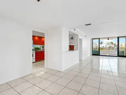 a kitchen with stainless steel appliances granite countertop a stove sink and cabinets