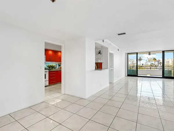a kitchen with stainless steel appliances granite countertop a stove sink and cabinets