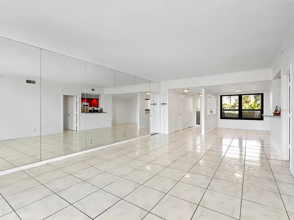 a view of an empty room and window