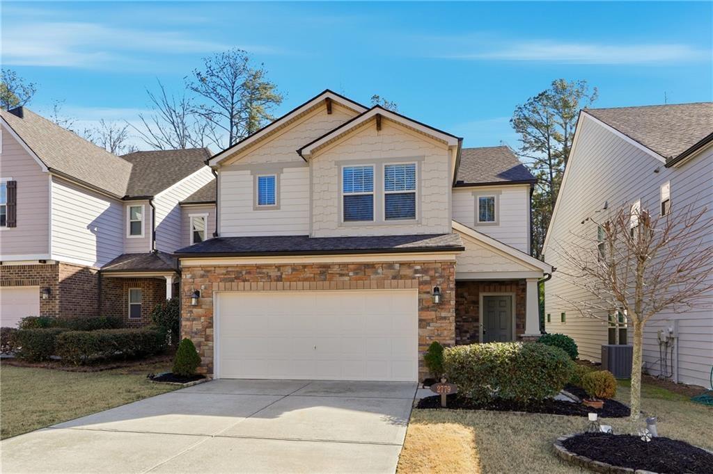 2719 Morgan Spring Trail Buford, GA 30519 - Photo 45 of 46 a front view of a house with a yard