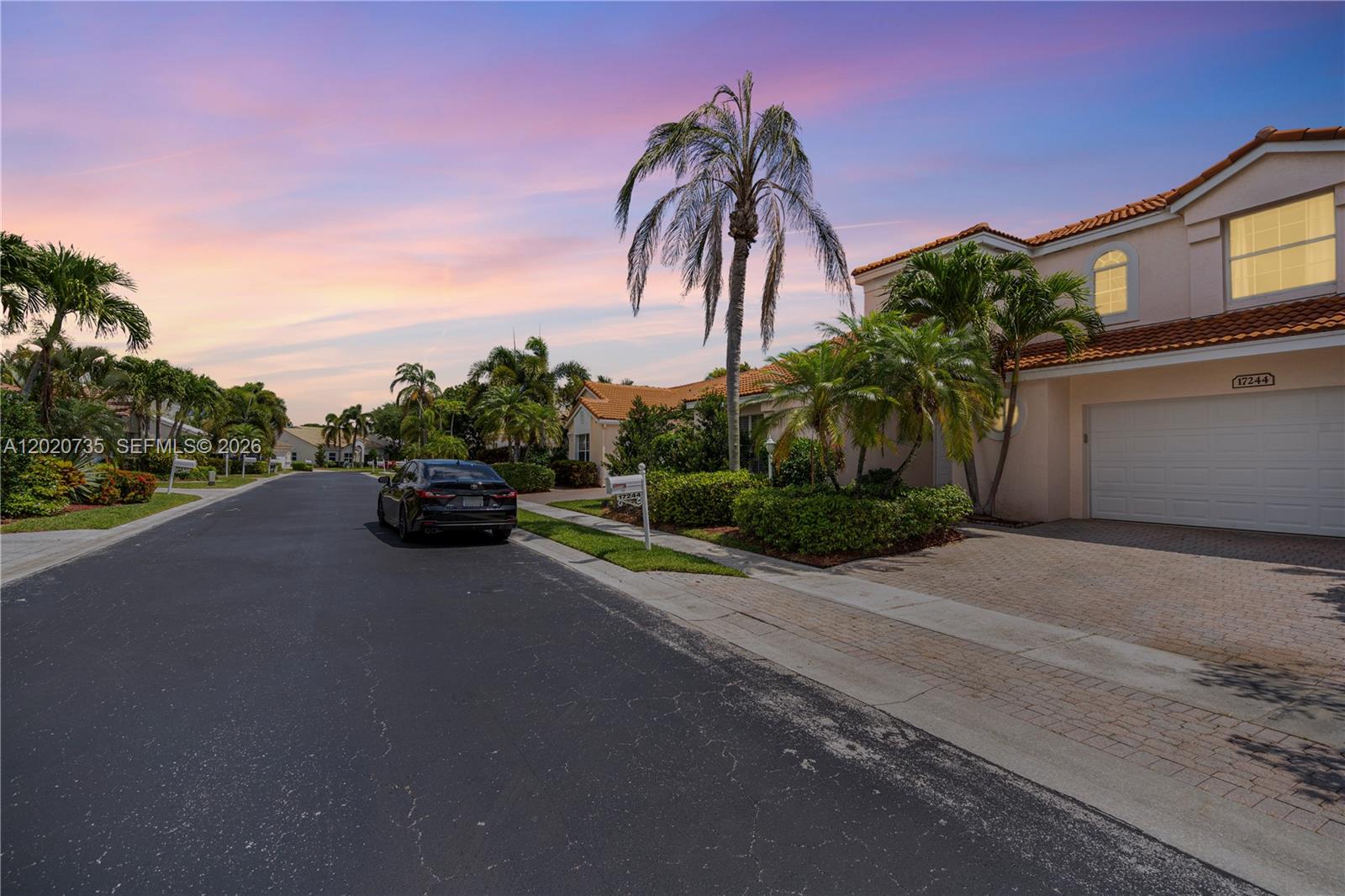 17244 Balboa Point Way Boca Raton, FL 33487 - Photo 60 of 66 a car parked on the side of the road