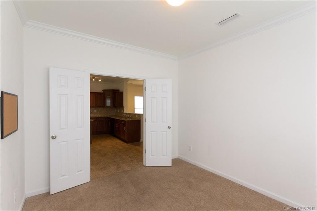9609 Fernspray Road Charlotte, NC 28213 - Photo 15 of 30 a view of a room with a hallway