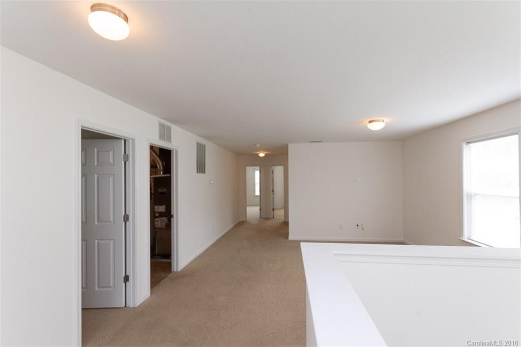 9609 Fernspray Road Charlotte, NC 28213 - Photo 16 of 30 a view of an empty room with a window