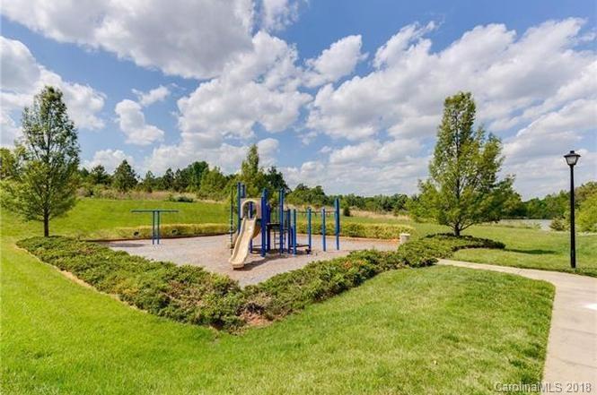 9609 Fernspray Road Charlotte, NC 28213 - Photo 29 of 30 a view of a park with swings and slides