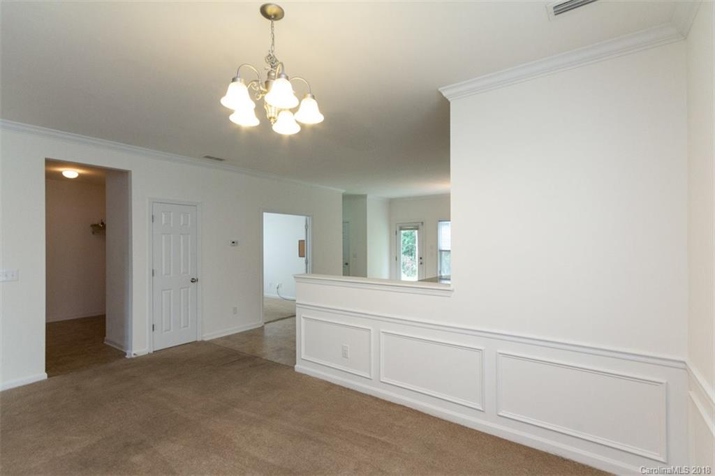 9609 Fernspray Road Charlotte, NC 28213 - Photo 10 of 30 a view of a windows and chandelier in a room