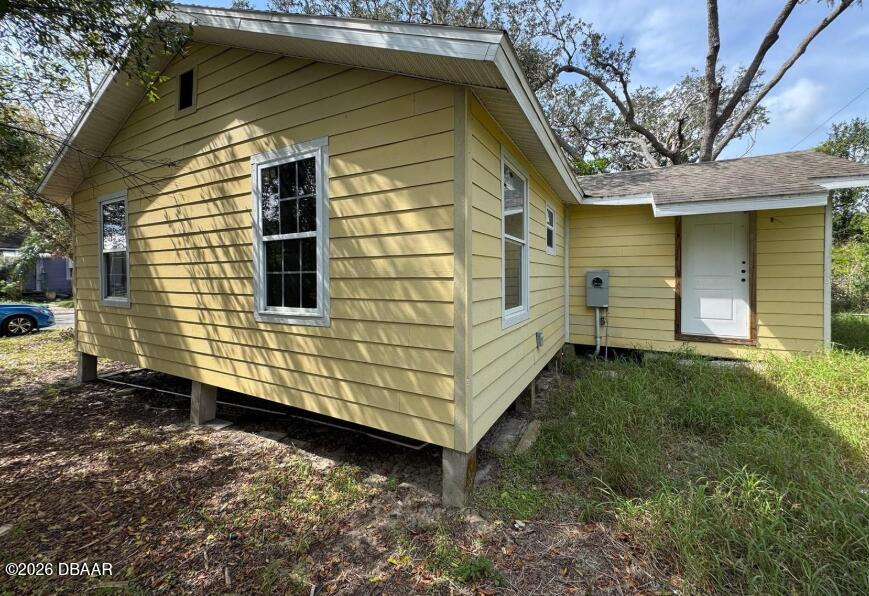 4718 2nd Street Sebring, FL 33870 - Photo 3 of 17 a view of a small house with a yard