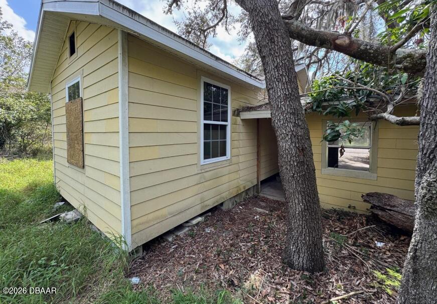 4718 2nd Street Sebring, FL 33870 - Photo 5 of 17 a view of a house with a yard