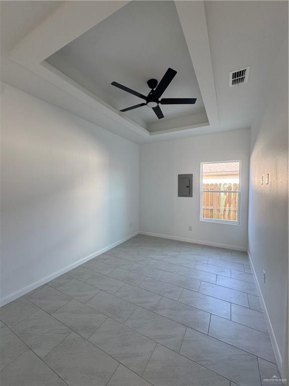 104 Sunflower Street, Unit 1 Mission, TX 78572 - Photo 16 of 21 an empty room with a empty space and windows