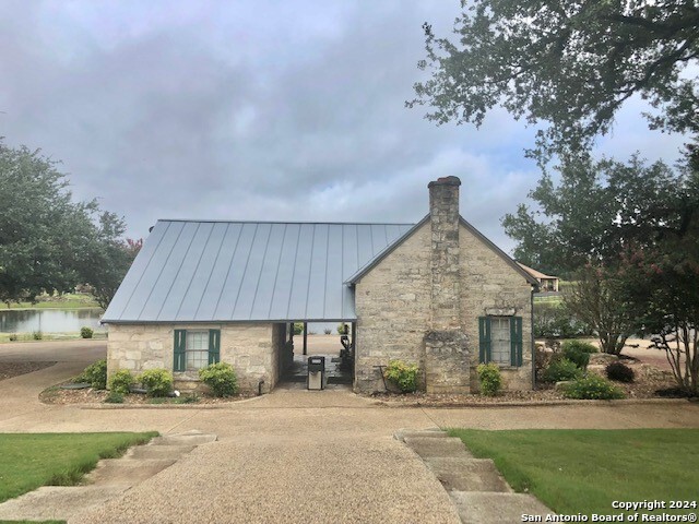 134 George Dolson Blanco, TX 78606 - Photo 15 of 17 front view of a house with a yard