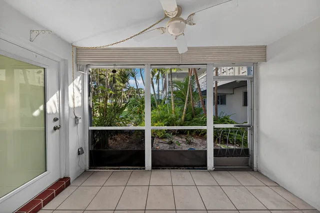 a view of an entryway with a glass door
