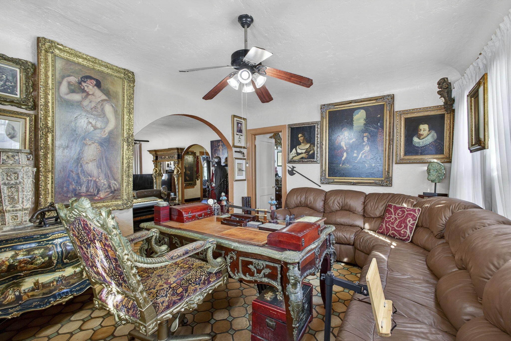 445 29th Street West Palm Beach, FL 33407 - Photo 11 of 61 a living room with patio furniture and a chandelier