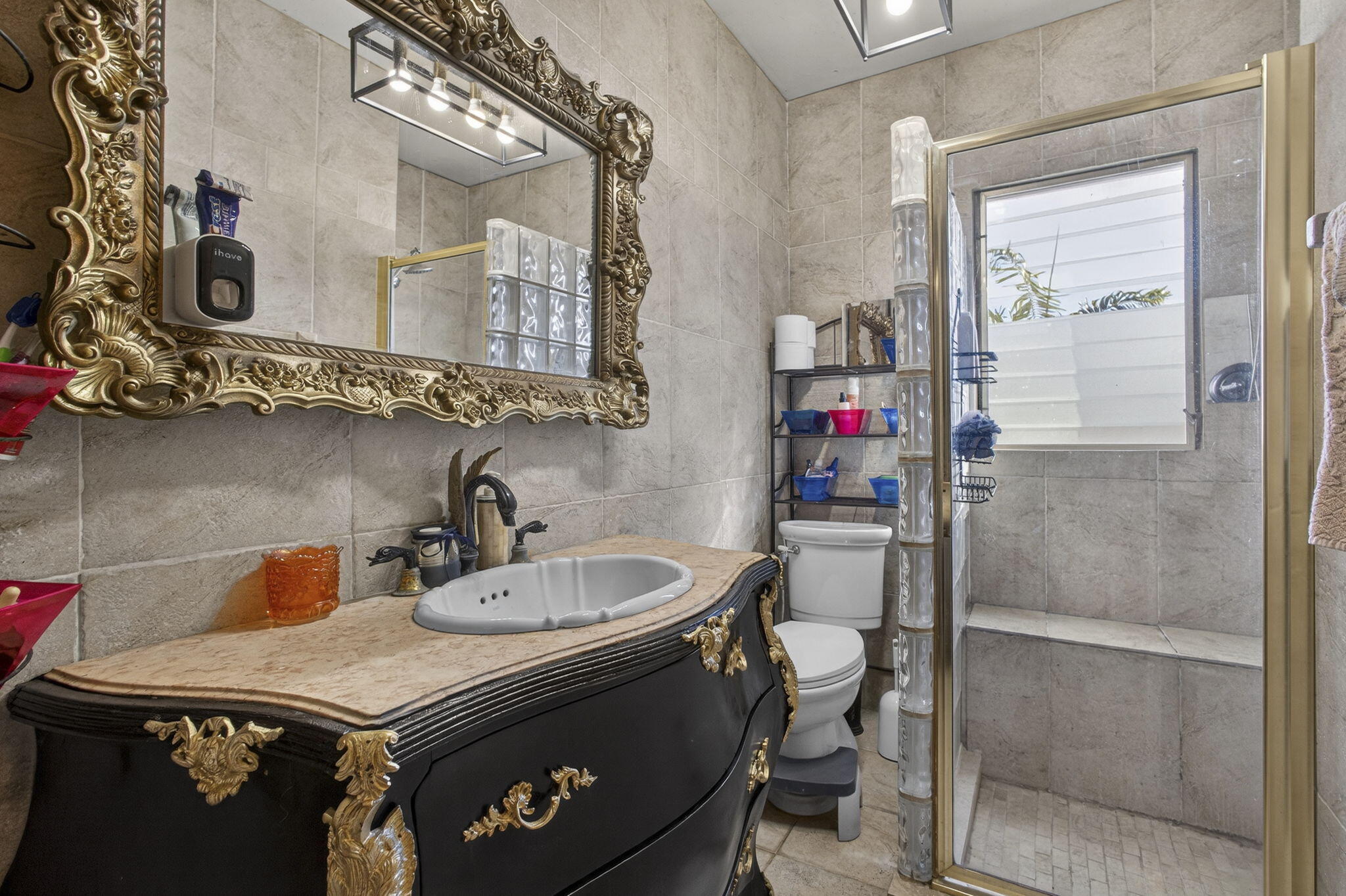 445 29th Street West Palm Beach, FL 33407 - Photo 34 of 61 a bathroom with a sink vanity and a mirror