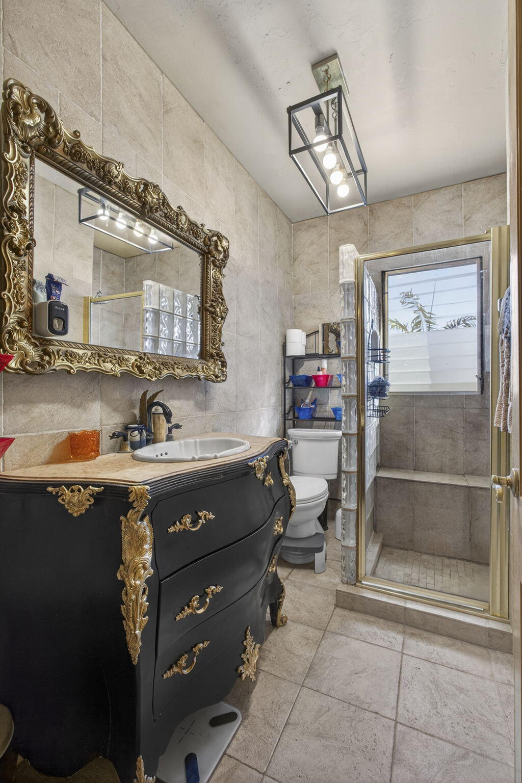 445 29th Street West Palm Beach, FL 33407 - Photo 35 of 61 a bathroom with a sink vanity and mirror