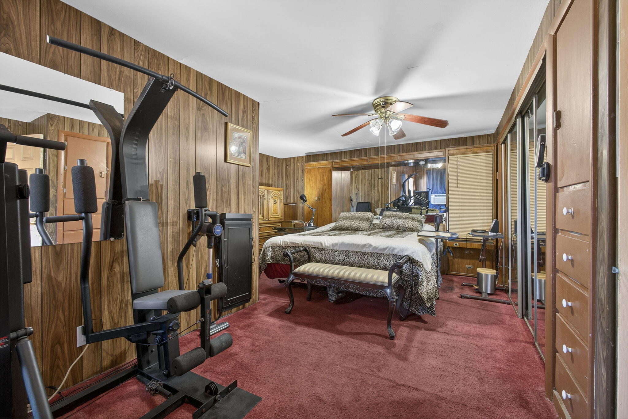 445 29th Street West Palm Beach, FL 33407 - Photo 38 of 61 a bedroom with furniture and a chandelier