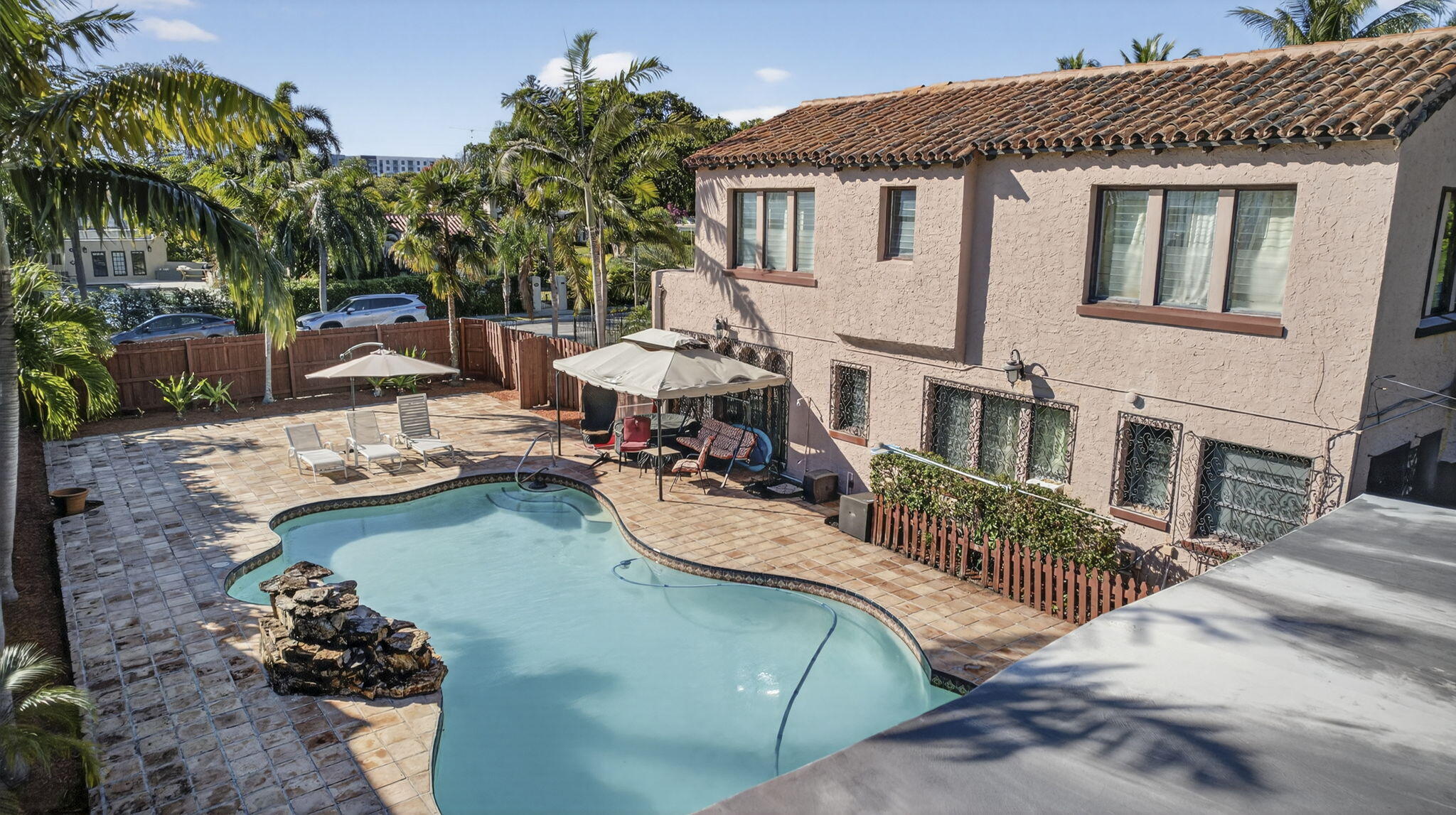 445 29th Street West Palm Beach, FL 33407 - Photo 45 of 61 a view of a house with backyard and sitting area