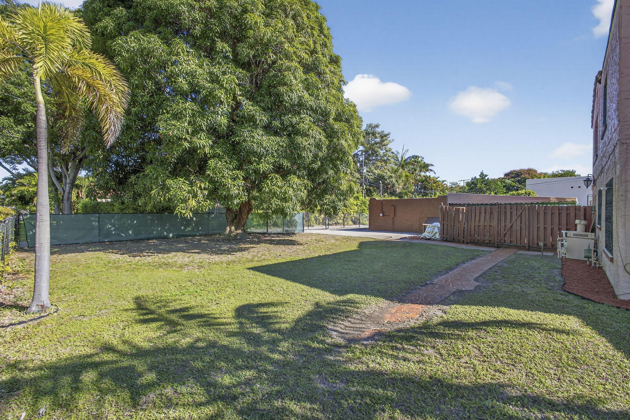 445 29th Street West Palm Beach, FL 33407 - Photo 50 of 61 view towards cottage and alley way