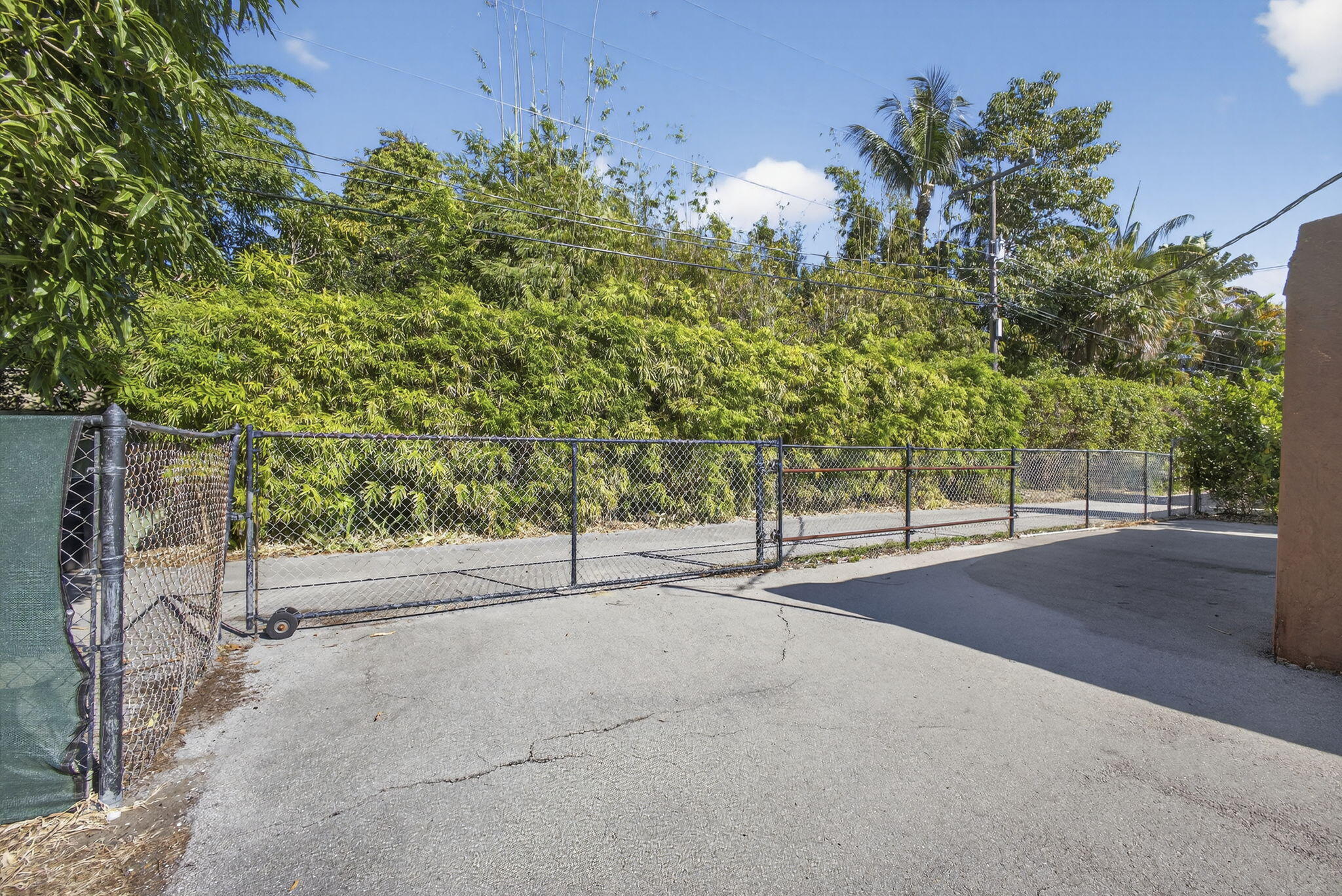 445 29th Street West Palm Beach, FL 33407 - Photo 54 of 61 a view of a street with a building in the background