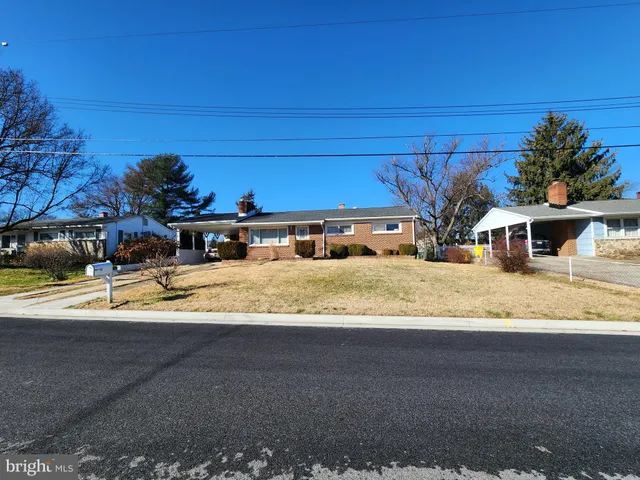 a view of road with houses