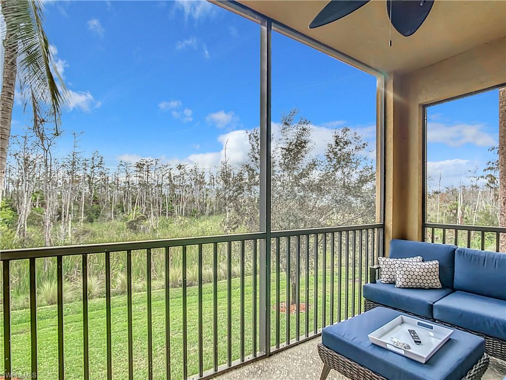 9715 Acqua Court, Unit 127 Naples, FL 34113 - Photo 45 of 50 a view of a city from a balcony
